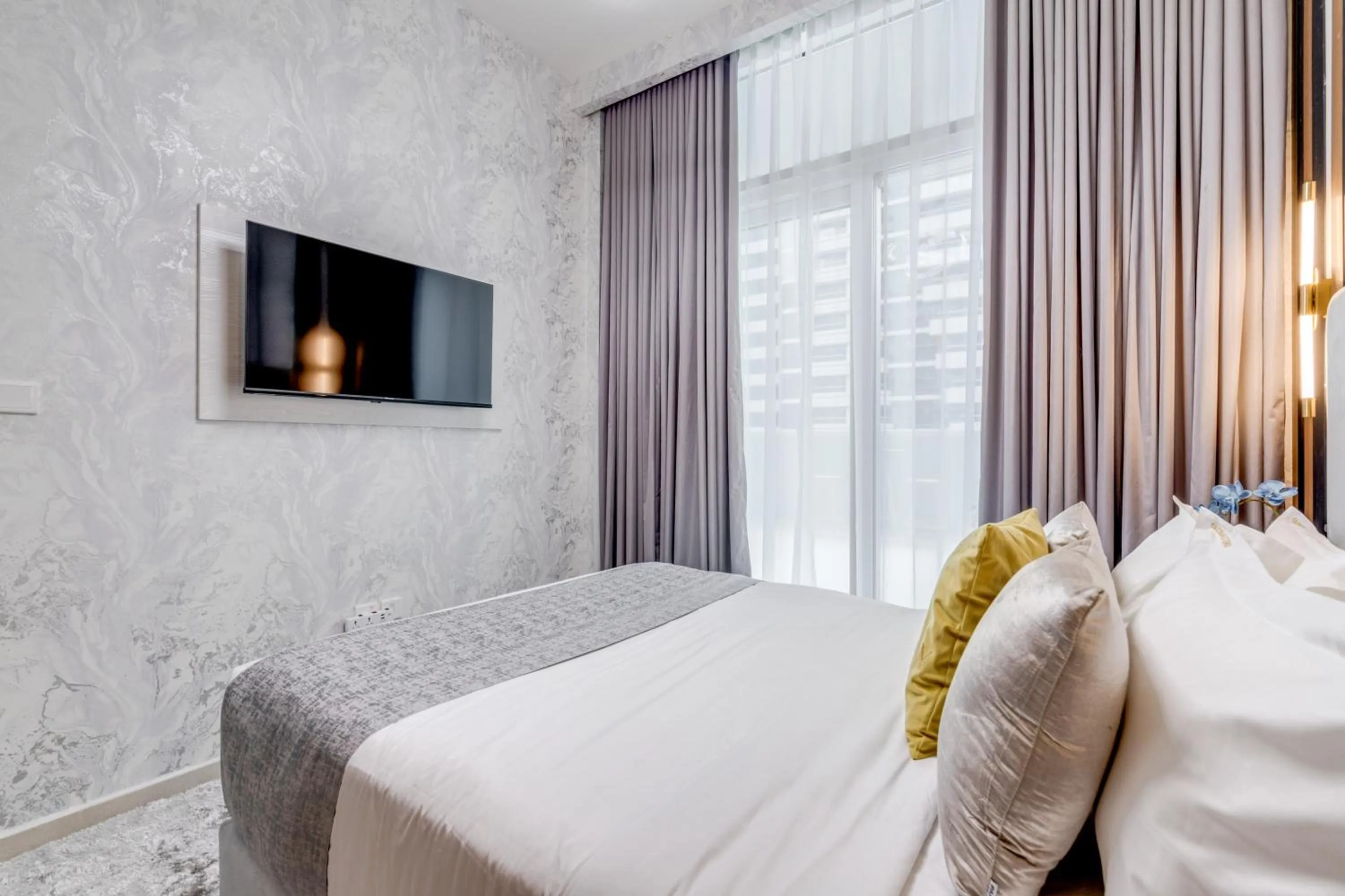 Bed in GLOBALSTAY. Luxury Apartments Near The Dubai Canal