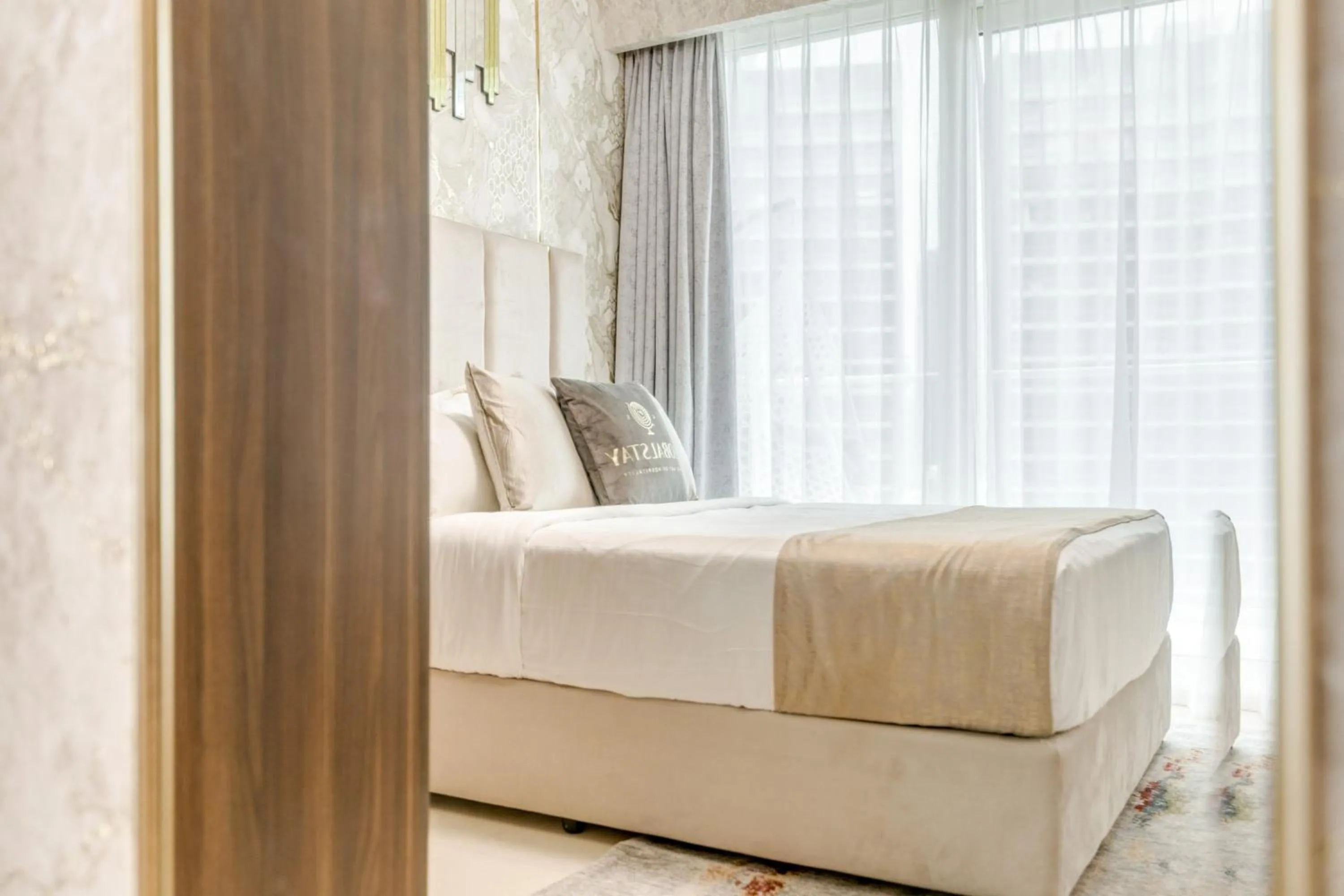 Bed in GLOBALSTAY. Luxury Apartments Near The Dubai Canal