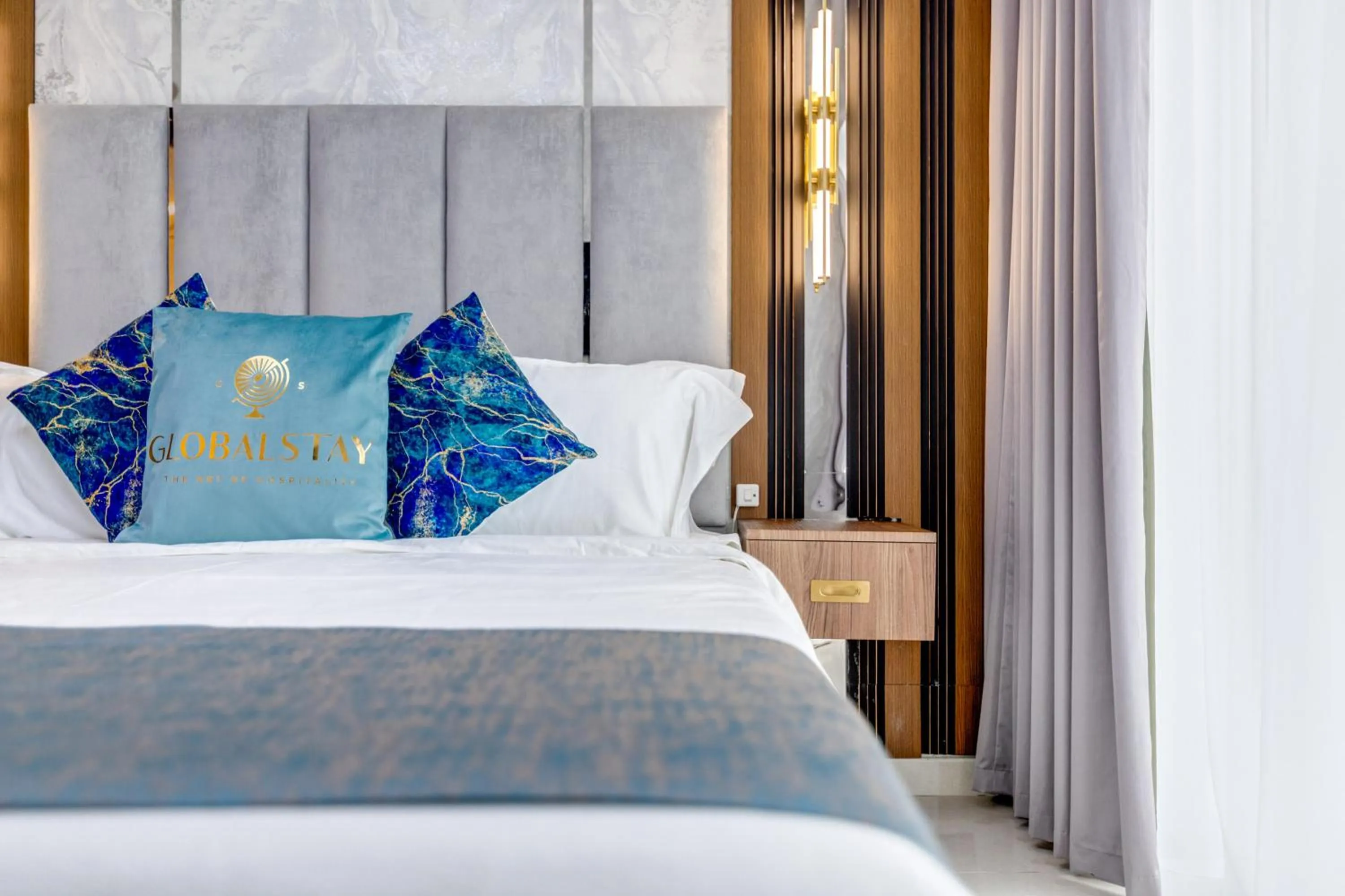 Bed in GLOBALSTAY. Luxury Apartments Near The Dubai Canal