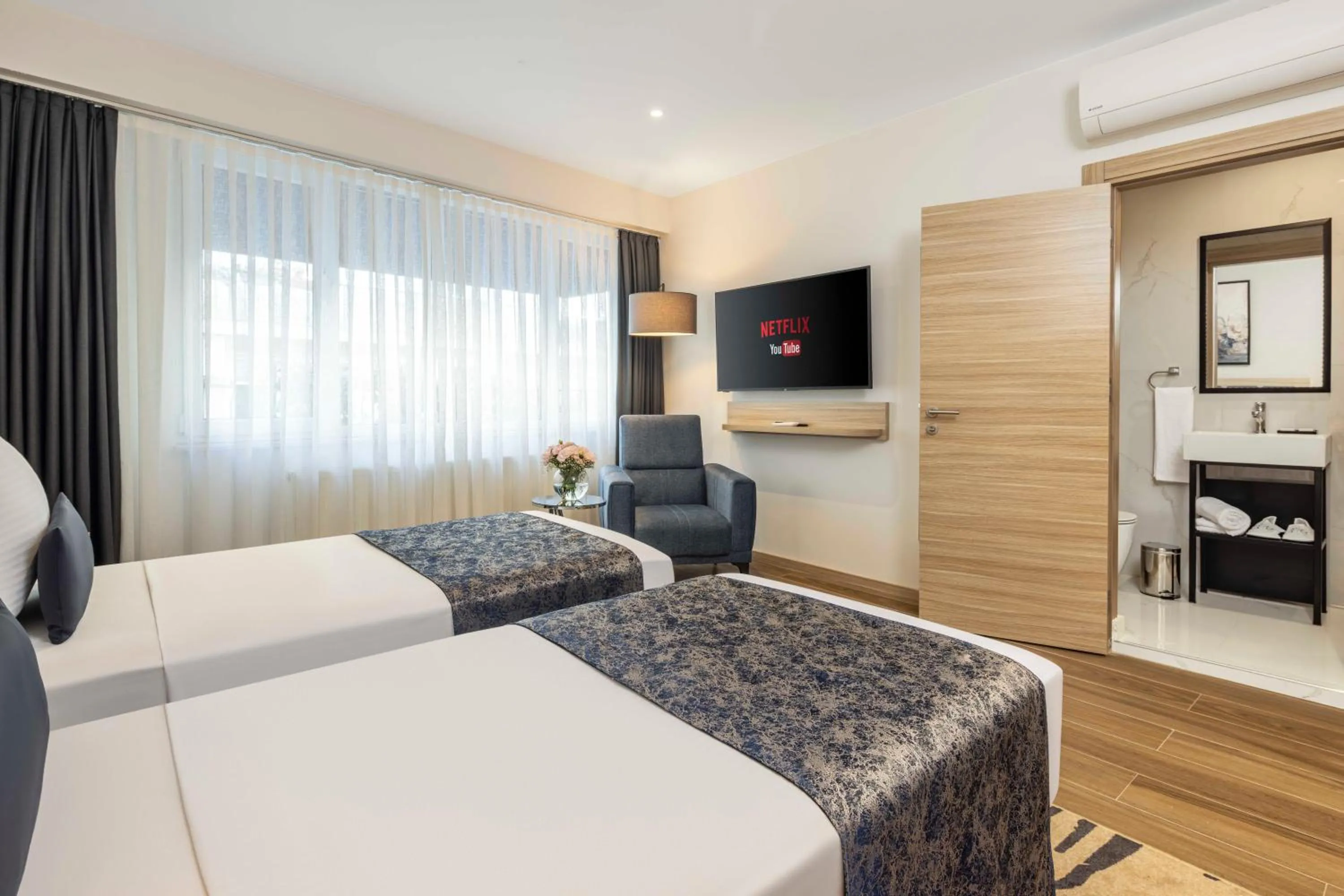 Photo of the whole room, Bed in The Capri Hotel Osmanbey