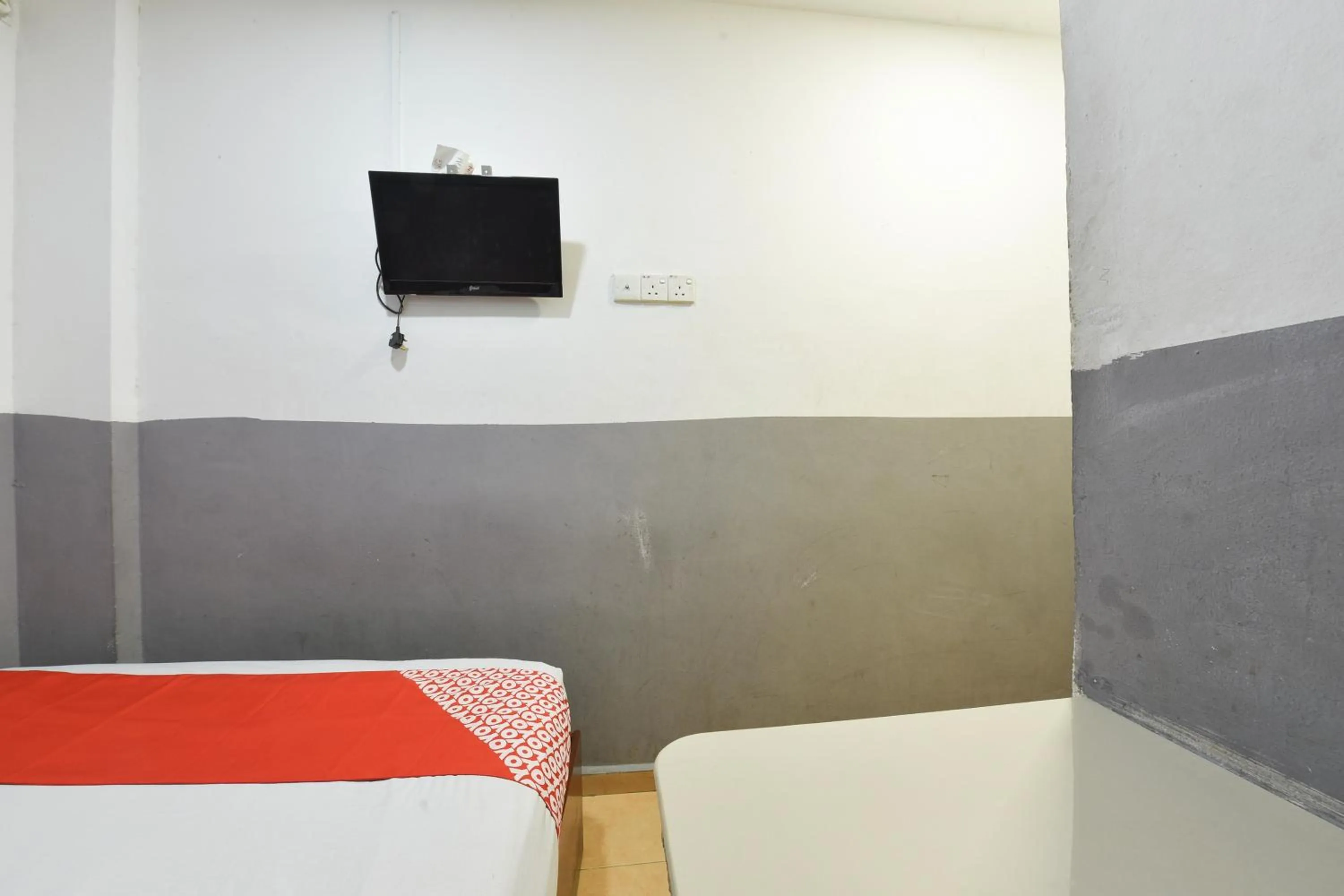 Bedroom in Hotel O Indah