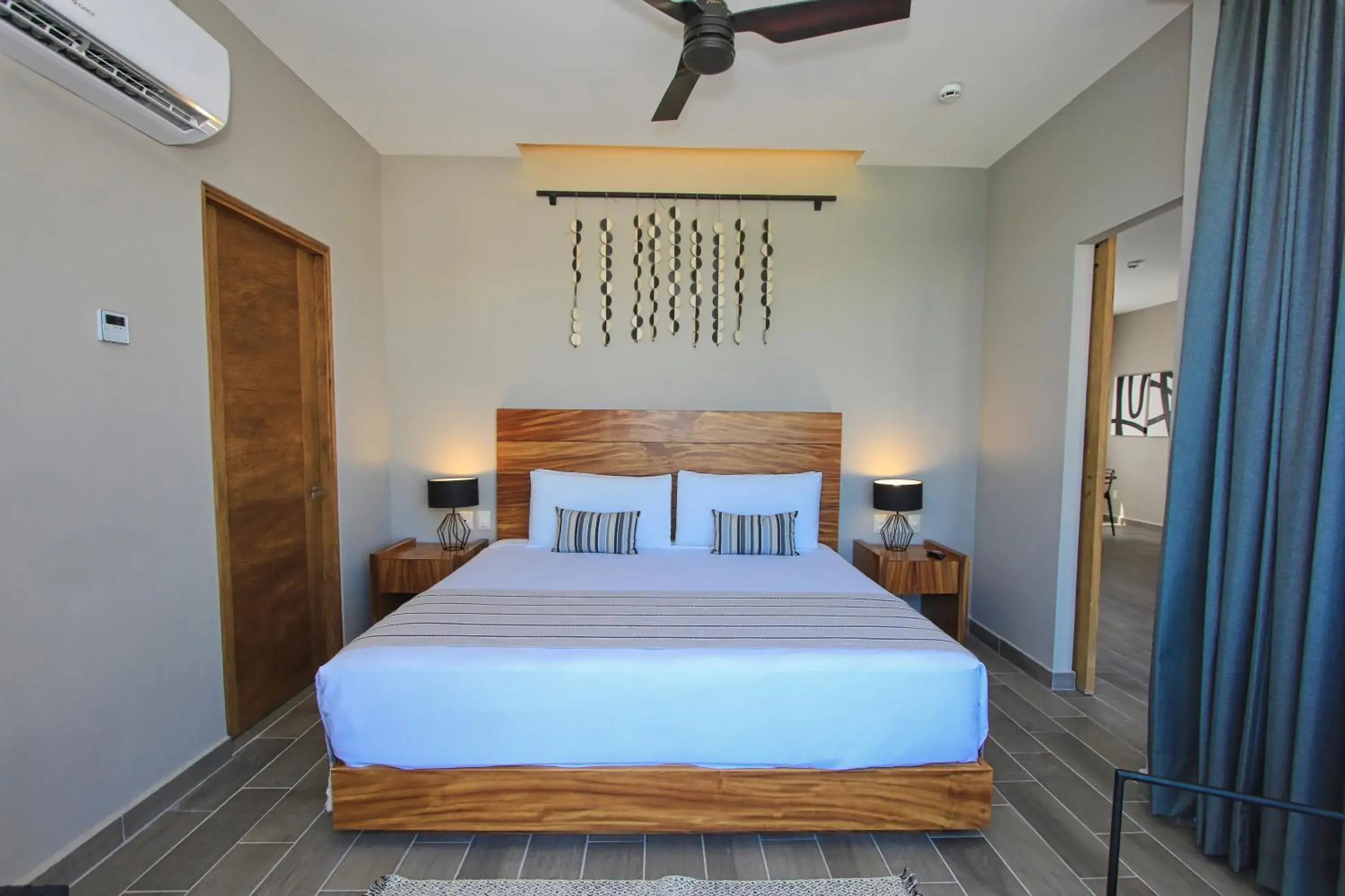 Bedroom, Bed in Nirú Ocean Suites by Binniguenda Bedroom, Bed in Nirú Ocean Suites by Binniguenda