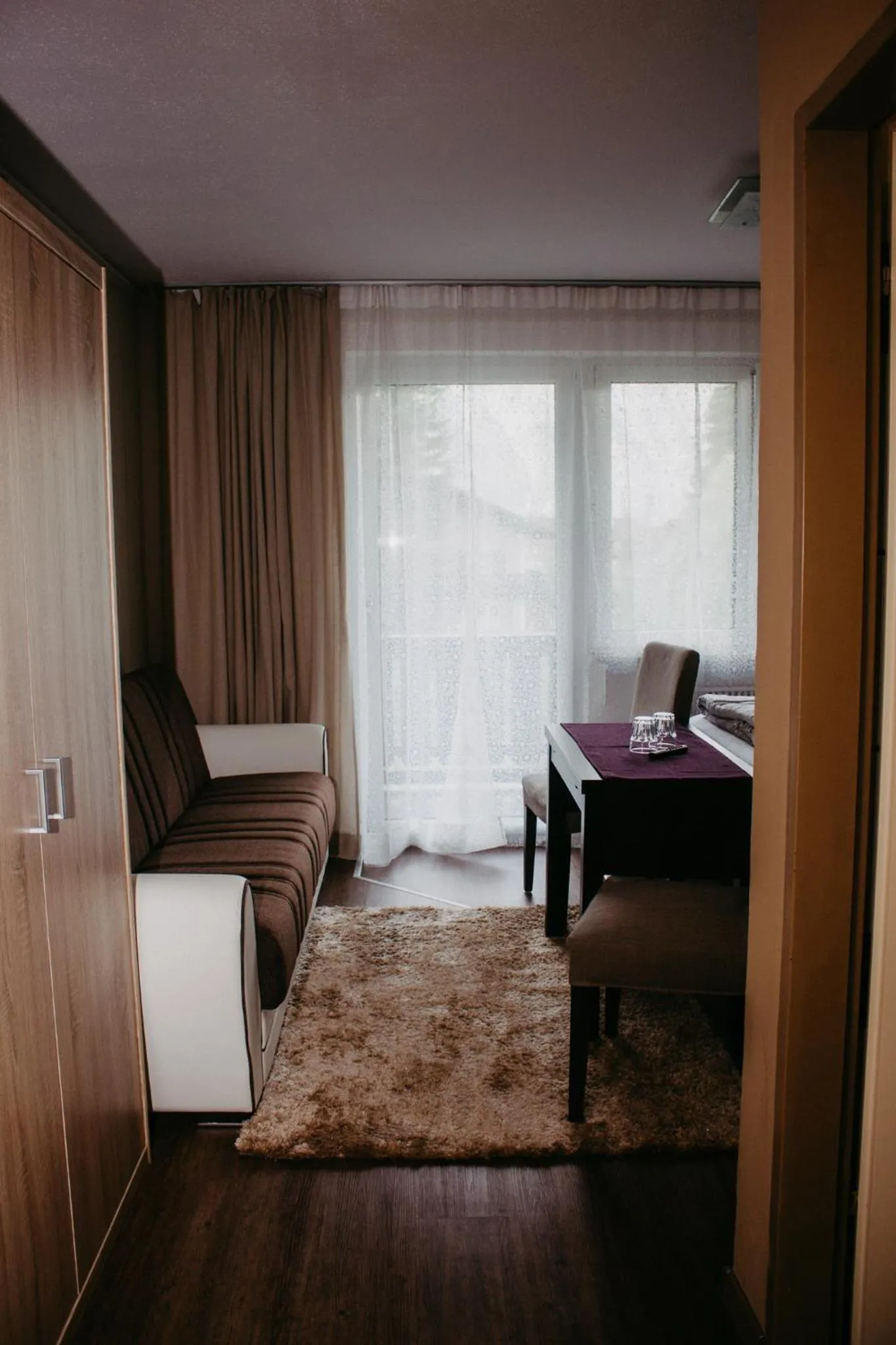 Seating area, Bed in Pension Leprich