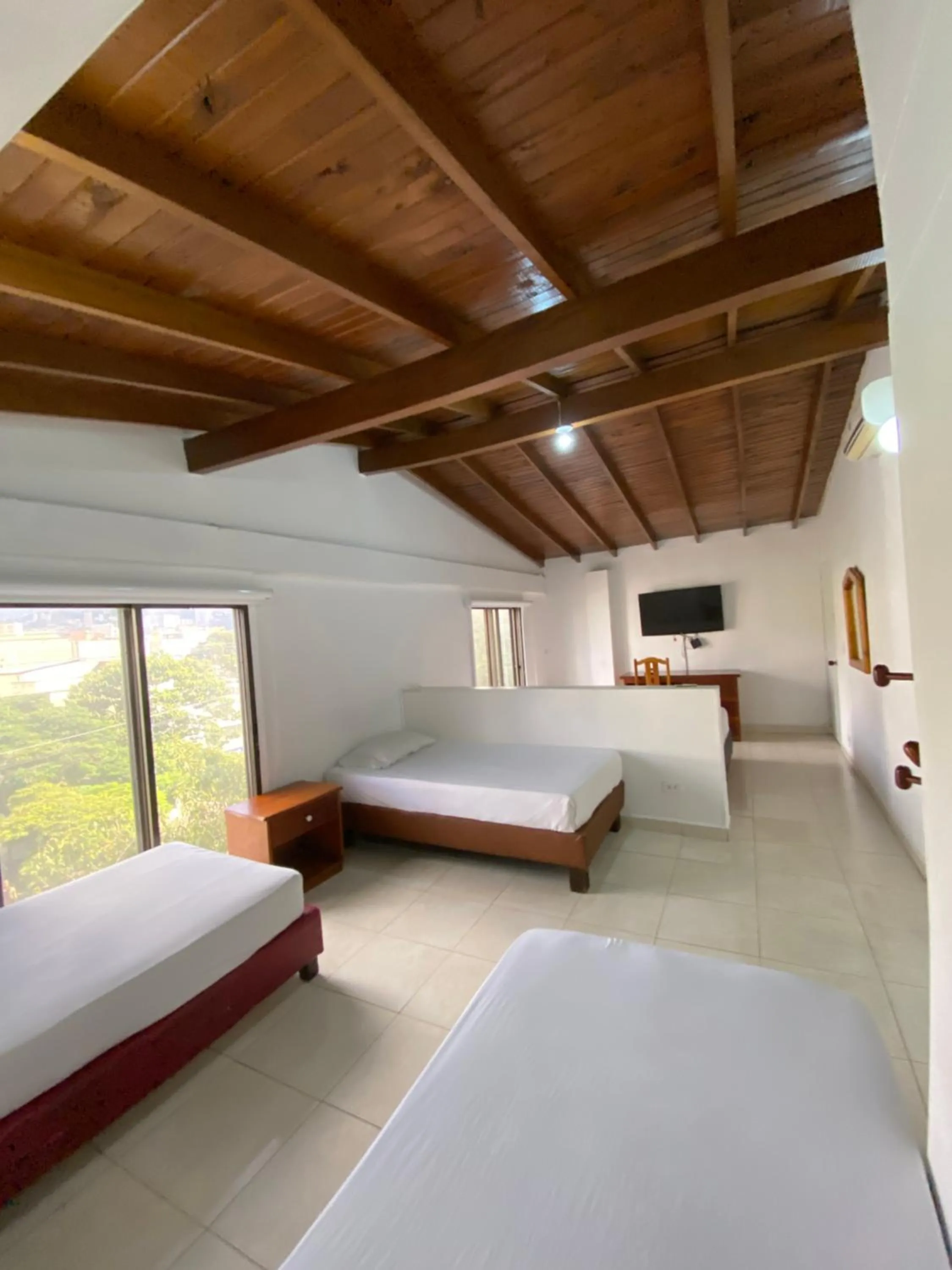 Photo of the whole room, Bed in Hotel Laureles 70