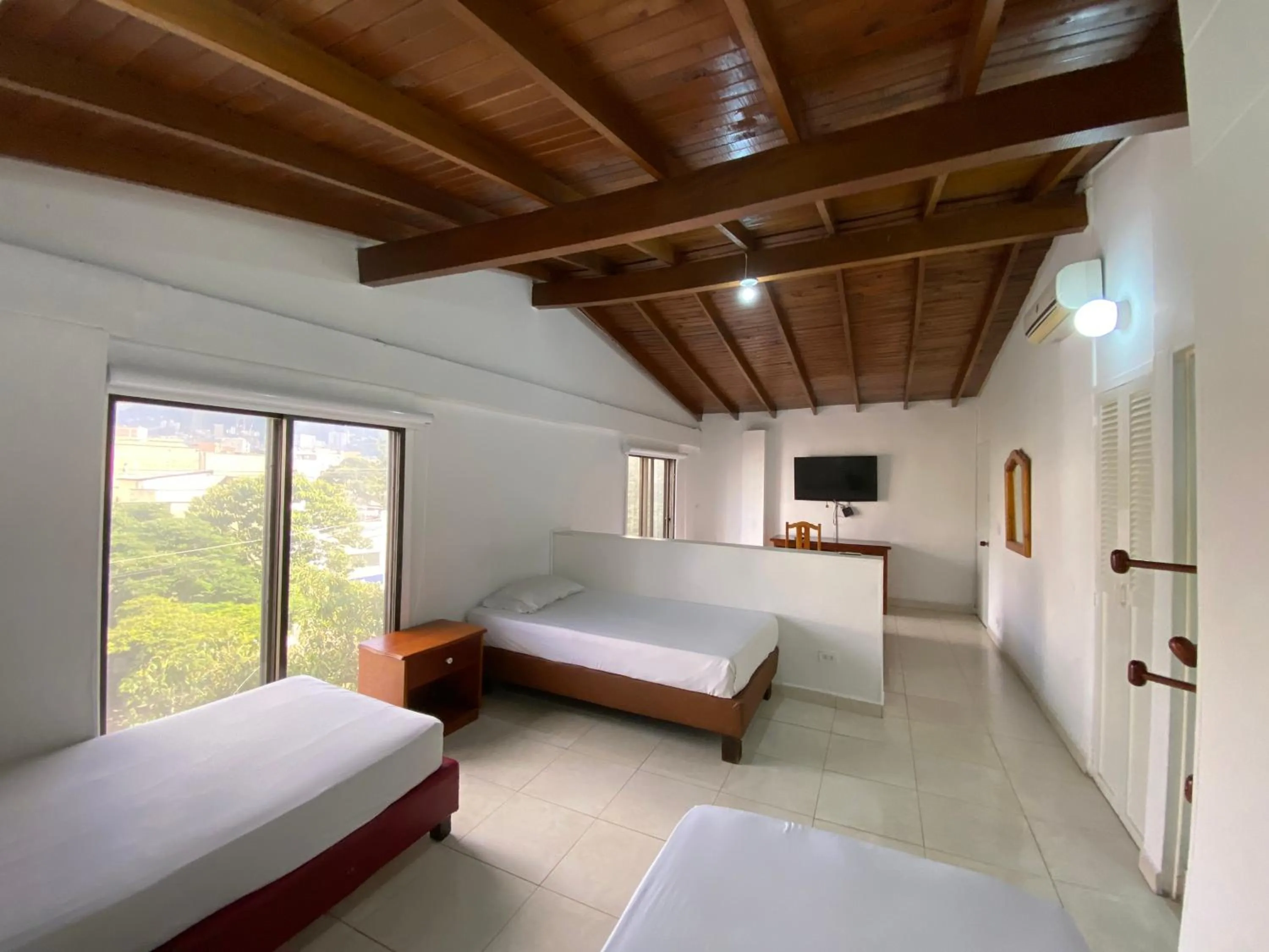 Bedroom, Bed in Hotel Laureles 70