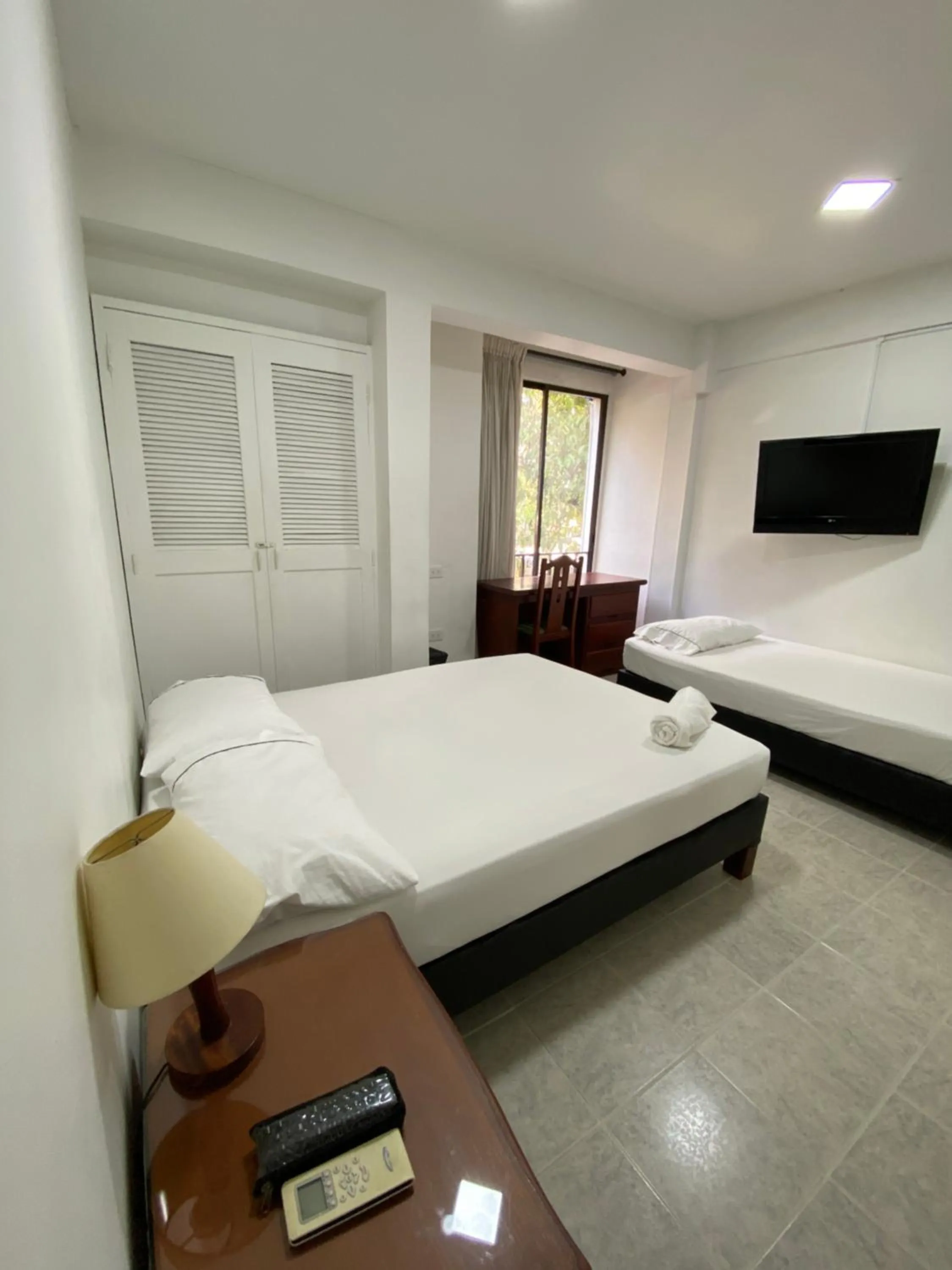 Bedroom, Bed in Hotel Laureles 70