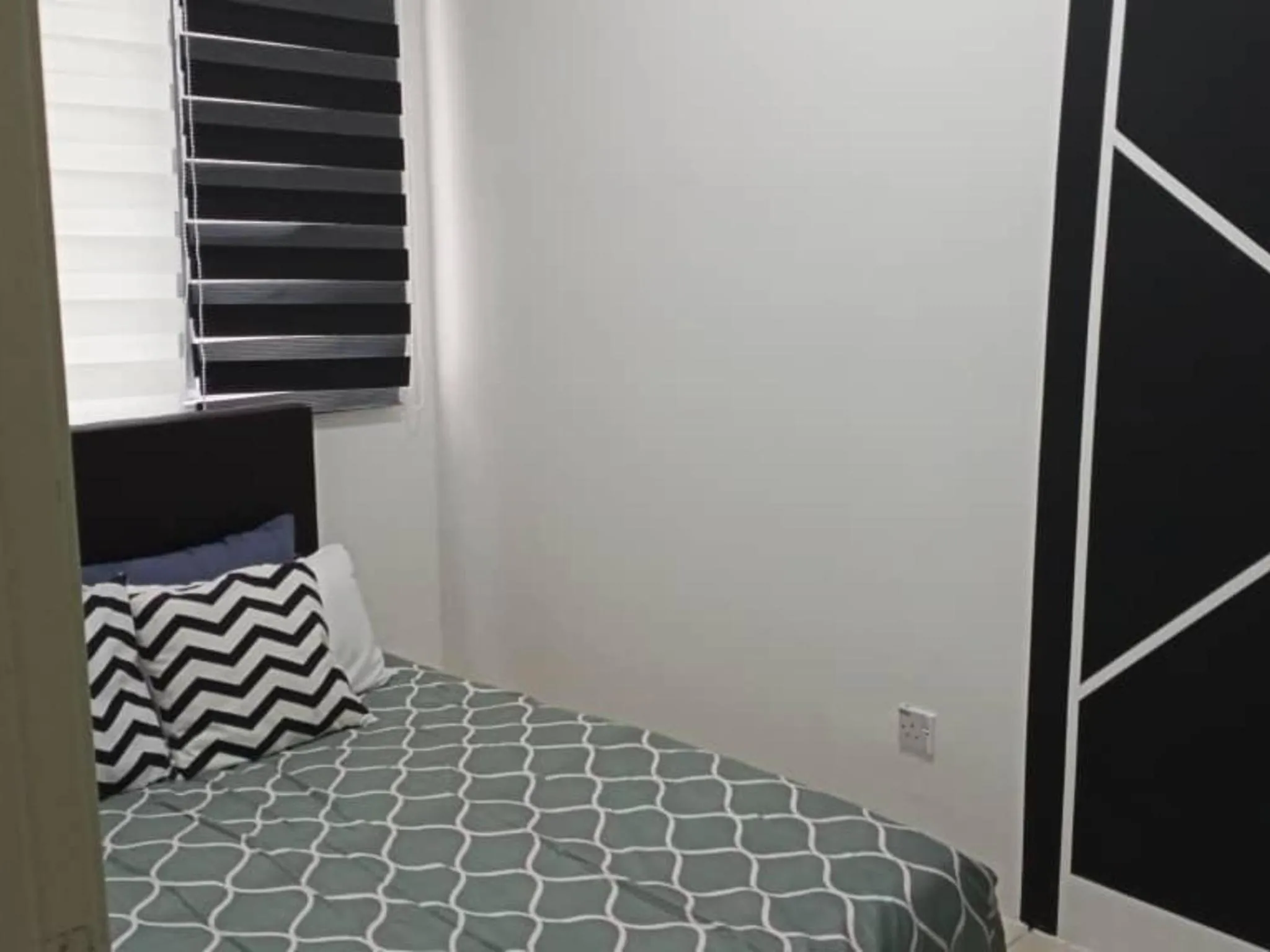 Bed in Barakah Sufi Home Stay Apartment Cameron