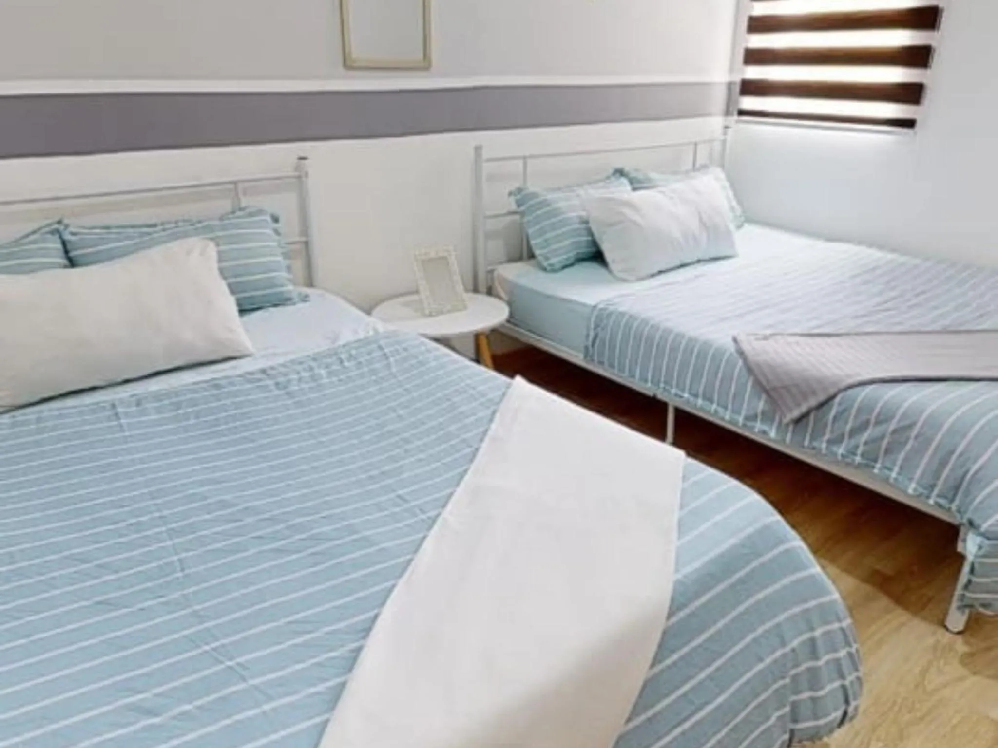 Bed in Barakah Sufi Home Stay Apartment Cameron