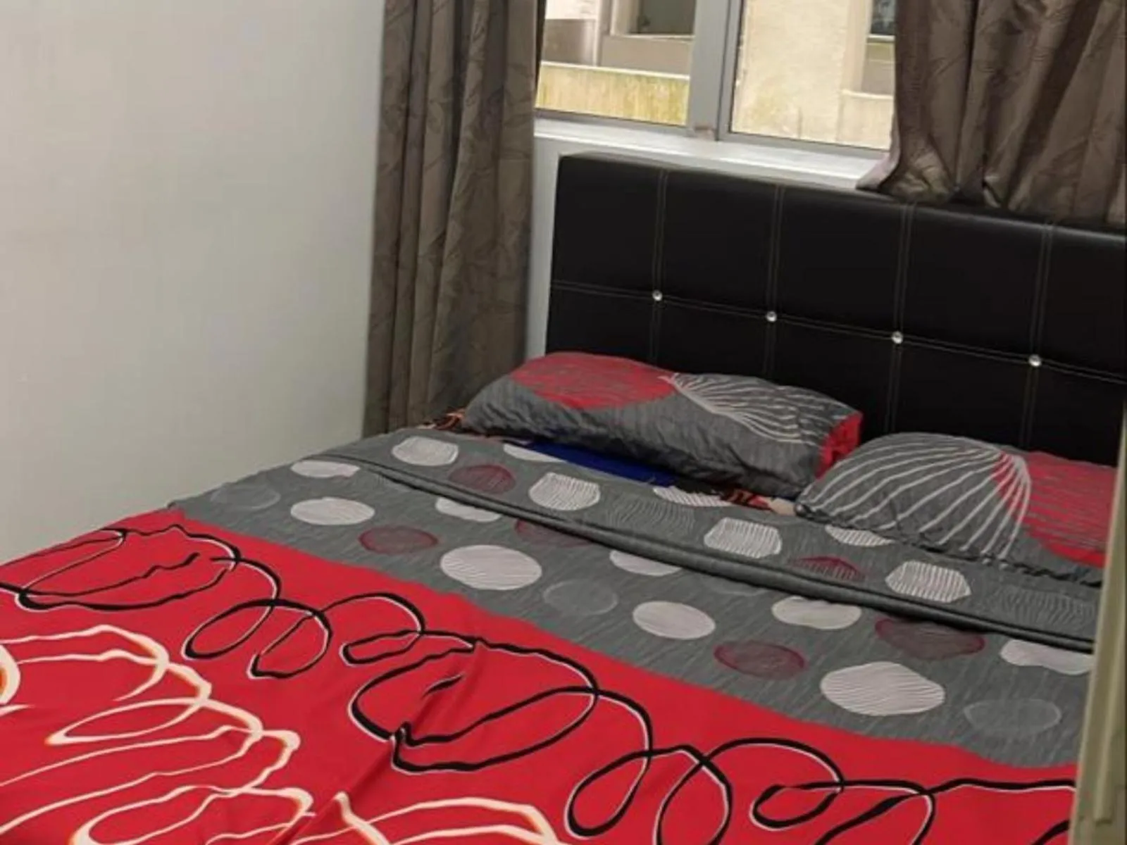 Bed in Barakah Sufi Home Stay Apartment Cameron