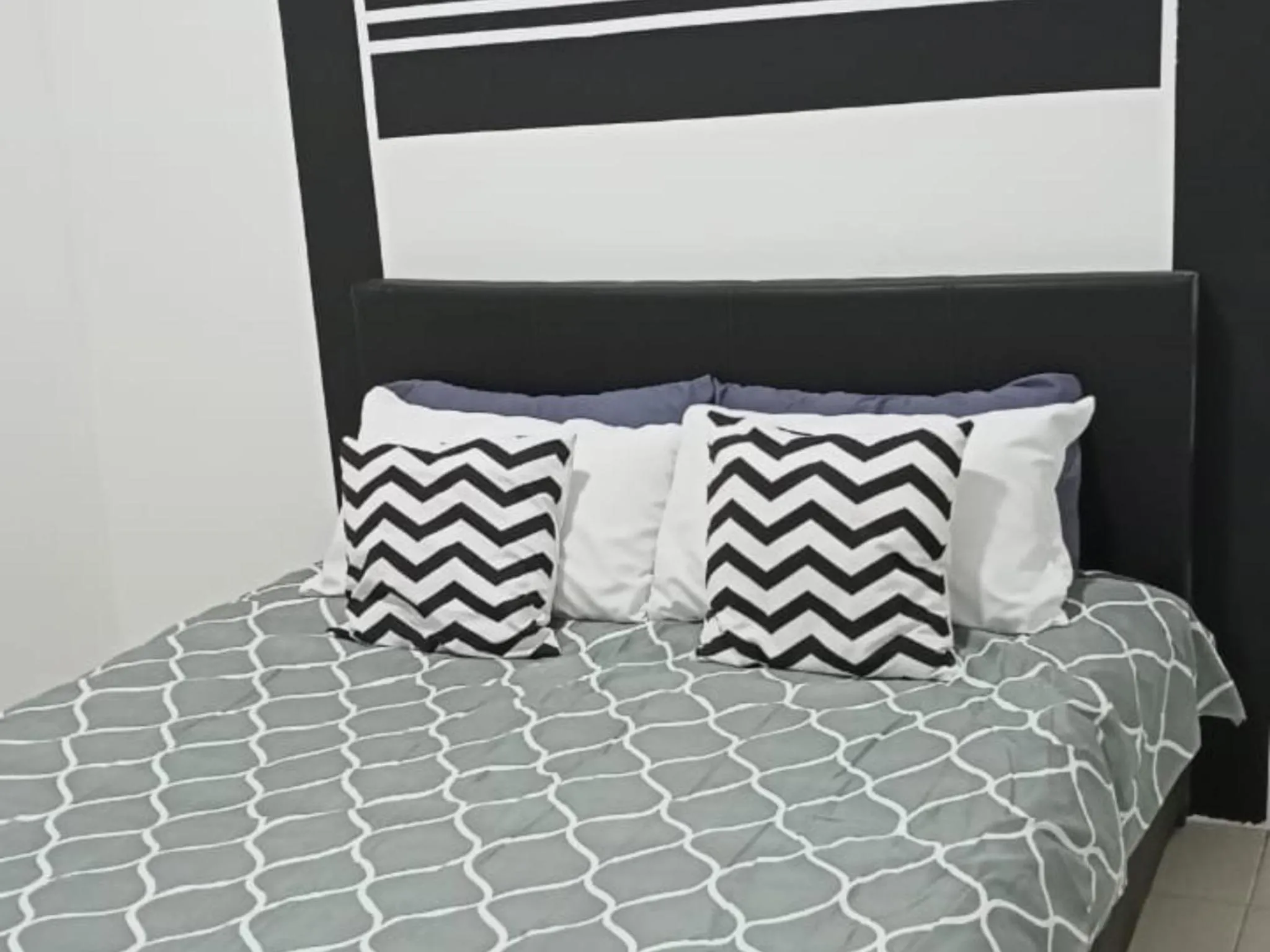 Bed in Barakah Sufi Home Stay Apartment Cameron