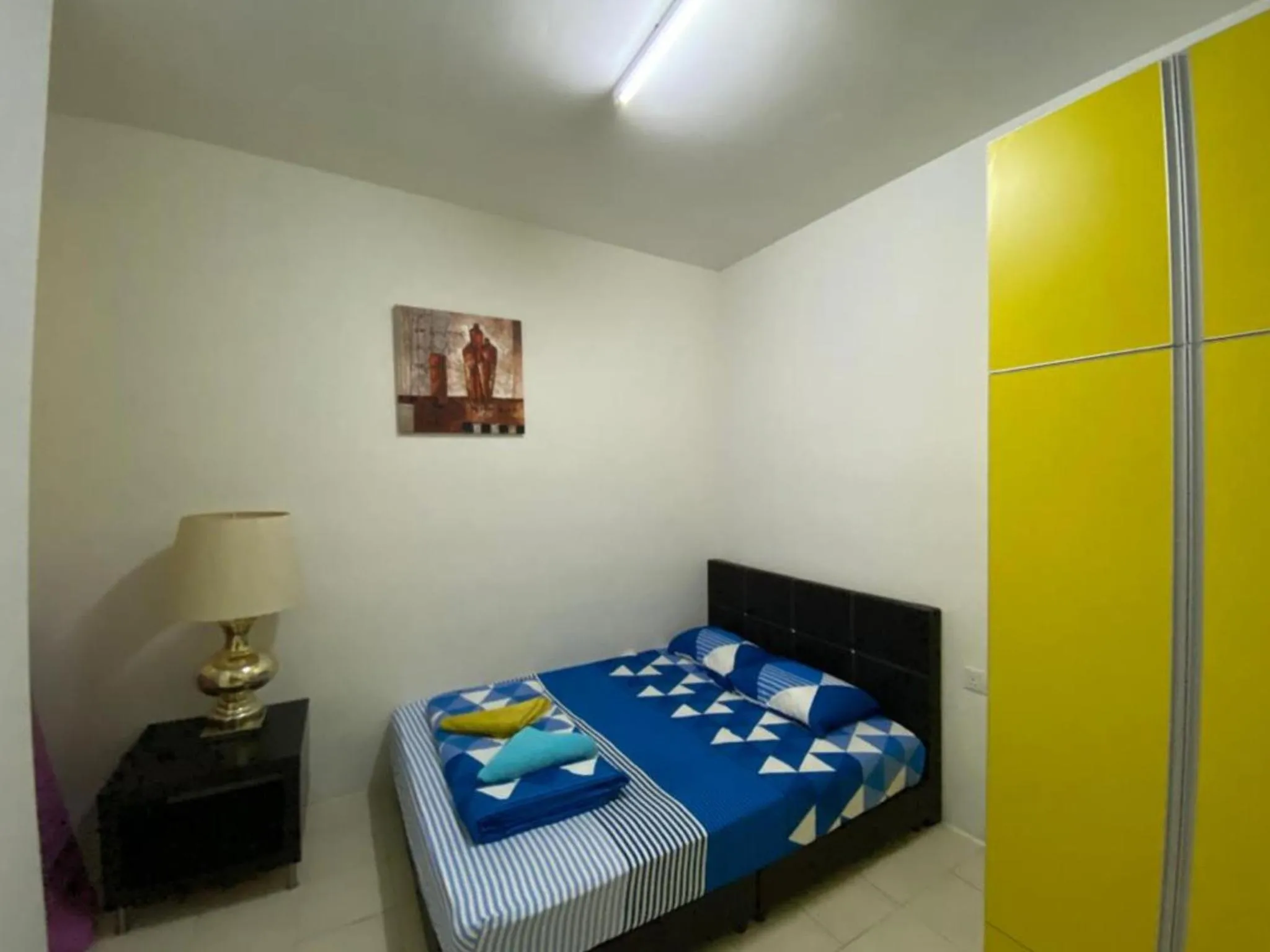 Bed in Barakah Sufi Home Stay Apartment Cameron