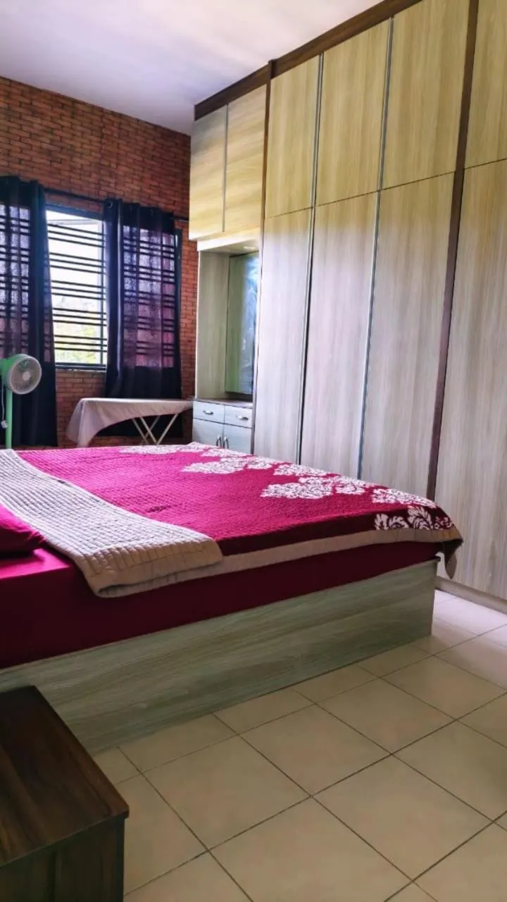 Bed in Barakah Sufi Home Stay Apartment Cameron