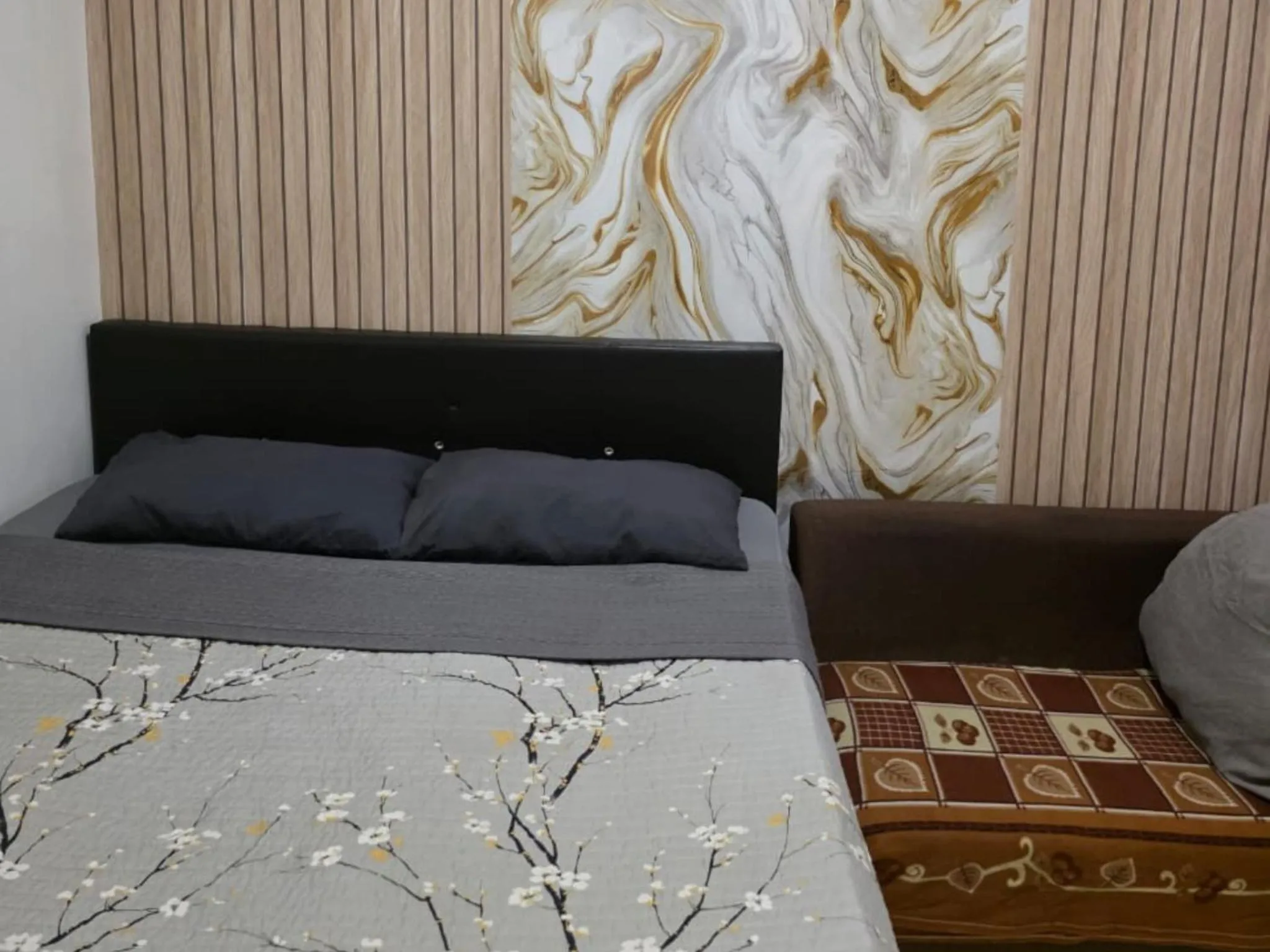 Bed in Barakah Sufi Home Stay Apartment Cameron