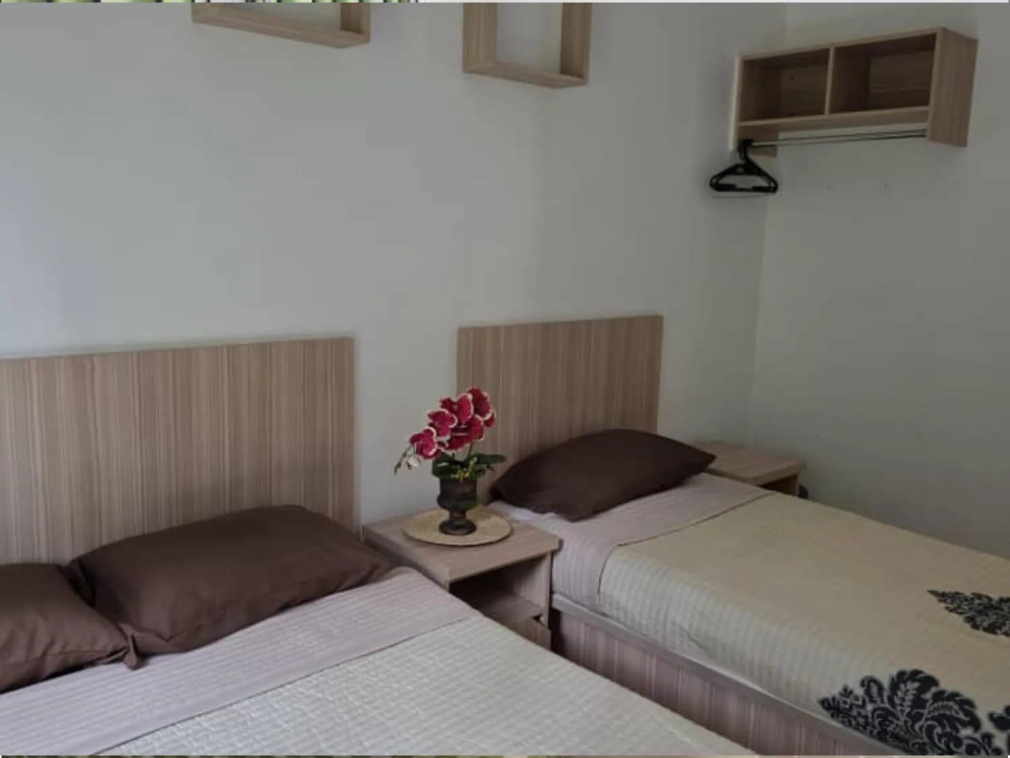 Bed in Barakah Sufi Home Stay Apartment Cameron