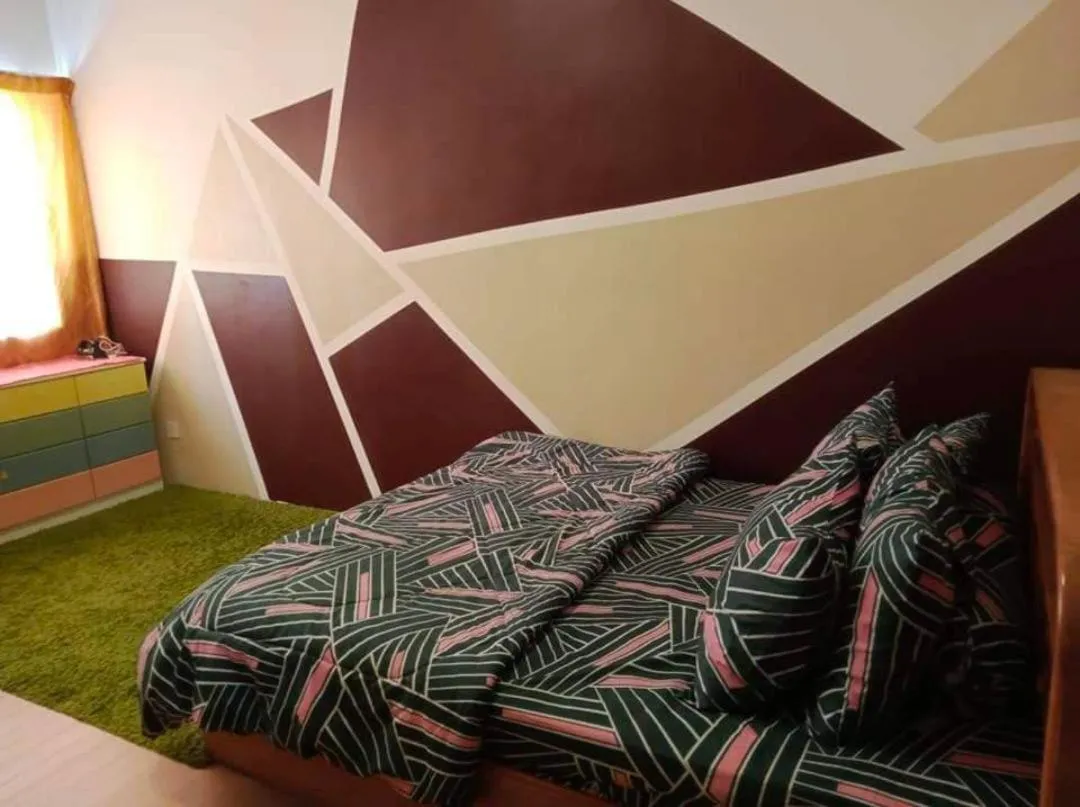 Bed in Barakah Sufi Home Stay Apartment Cameron