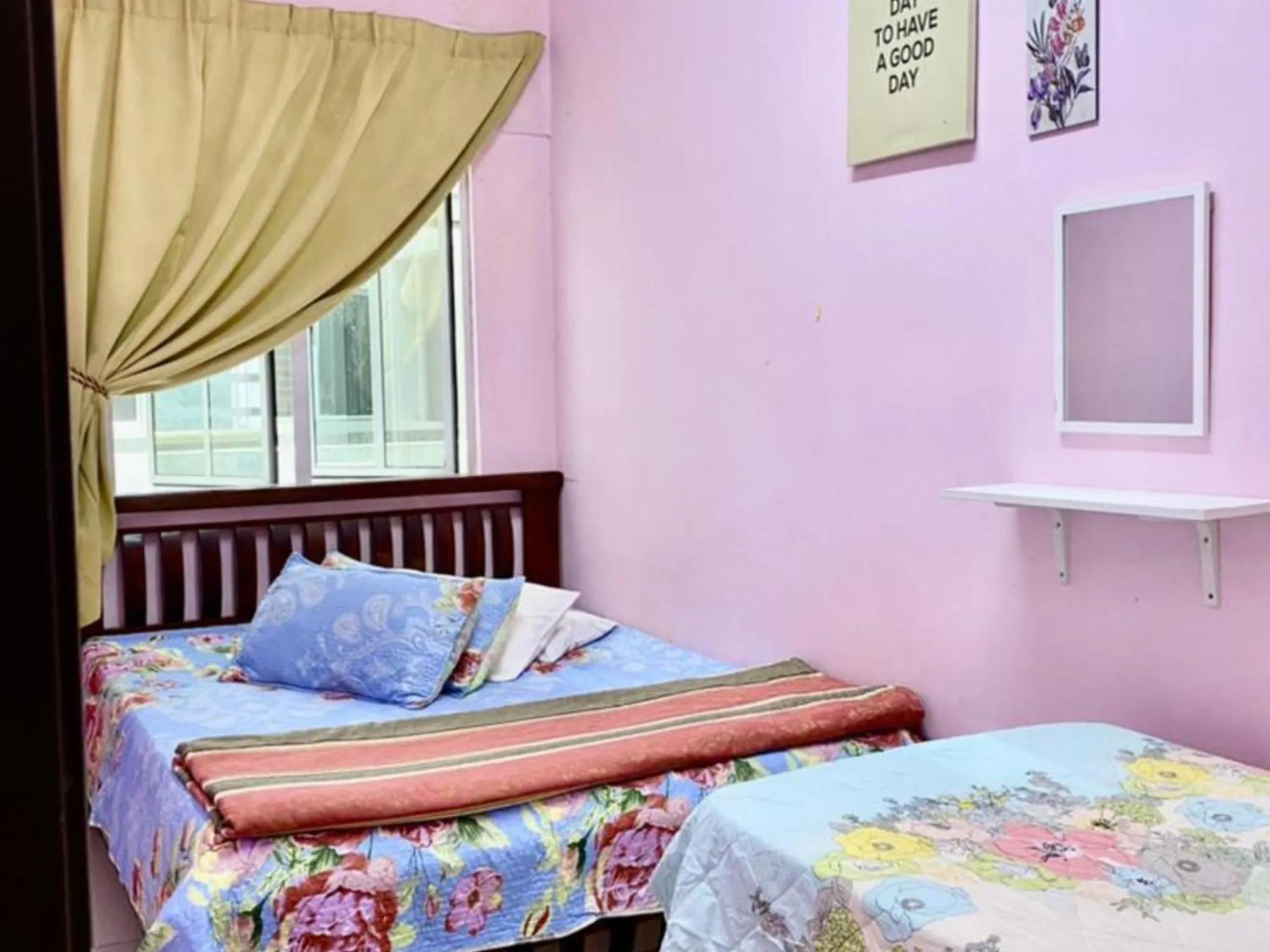 Bed in Barakah Sufi Home Stay Apartment Cameron
