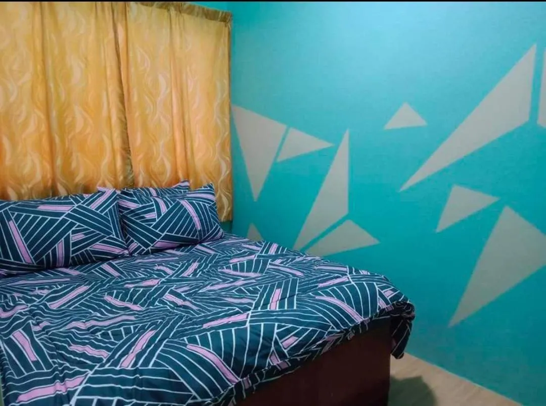 Bed in Barakah Sufi Home Stay Apartment Cameron