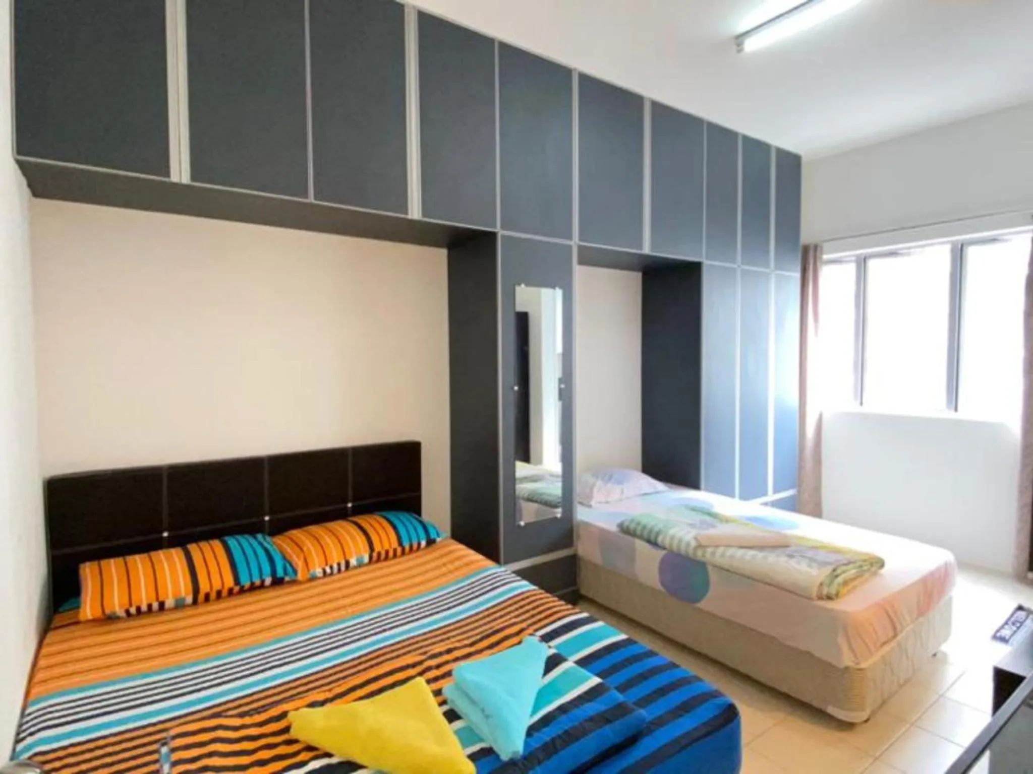 Bed in Barakah Sufi Home Stay Apartment Cameron
