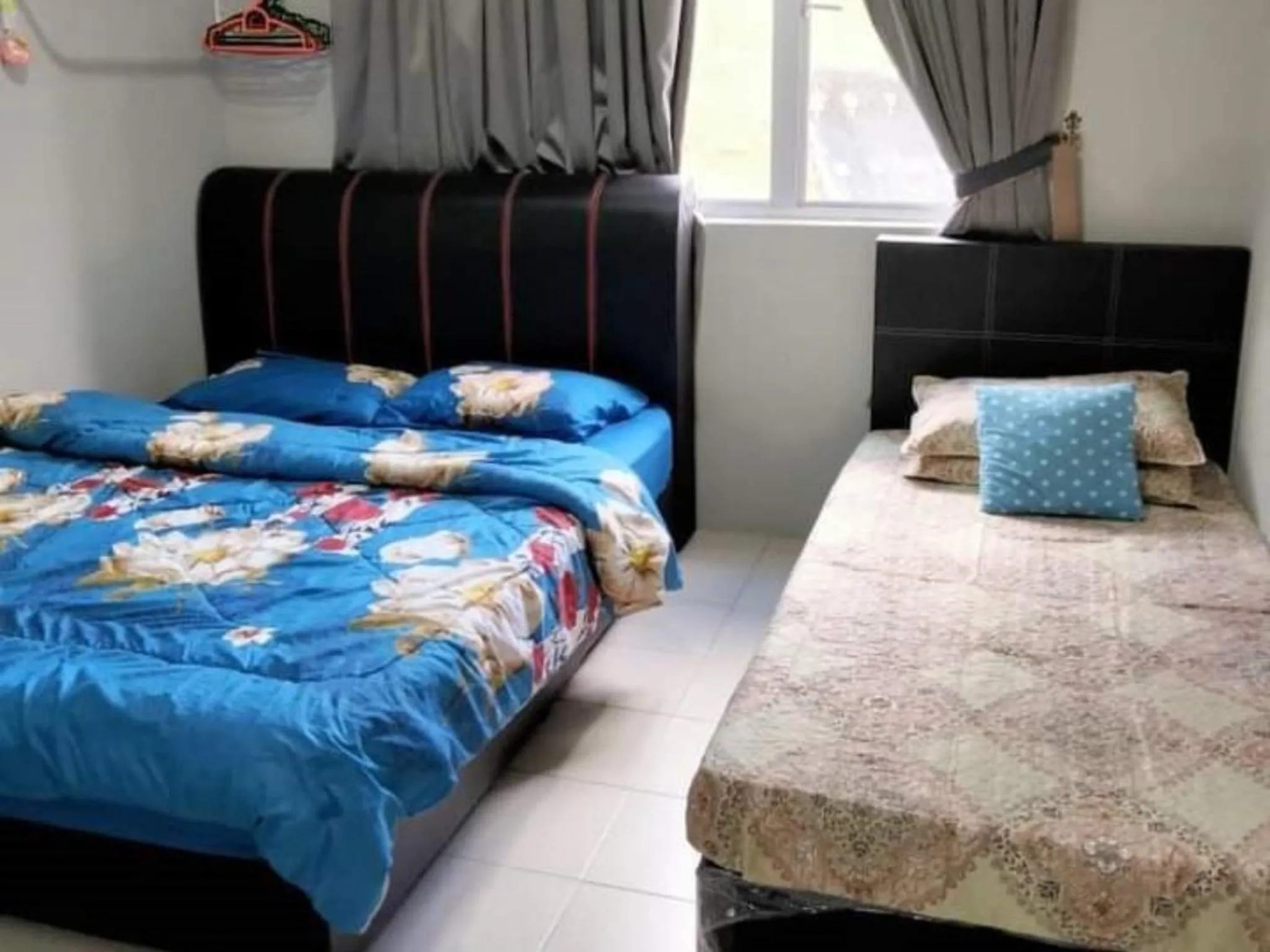 Bed in Barakah Sufi Home Stay Apartment Cameron