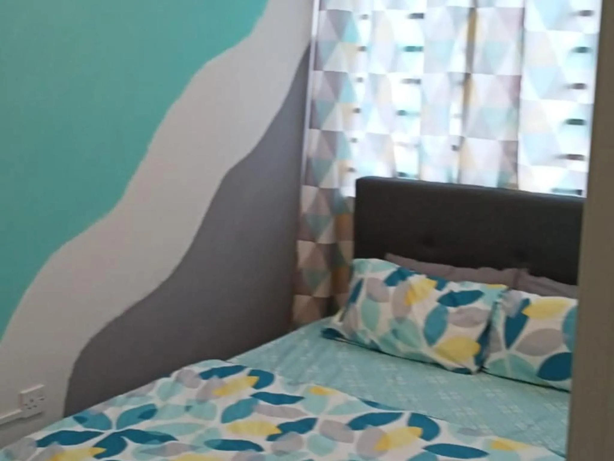 Bed in Barakah Sufi Home Stay Apartment Cameron