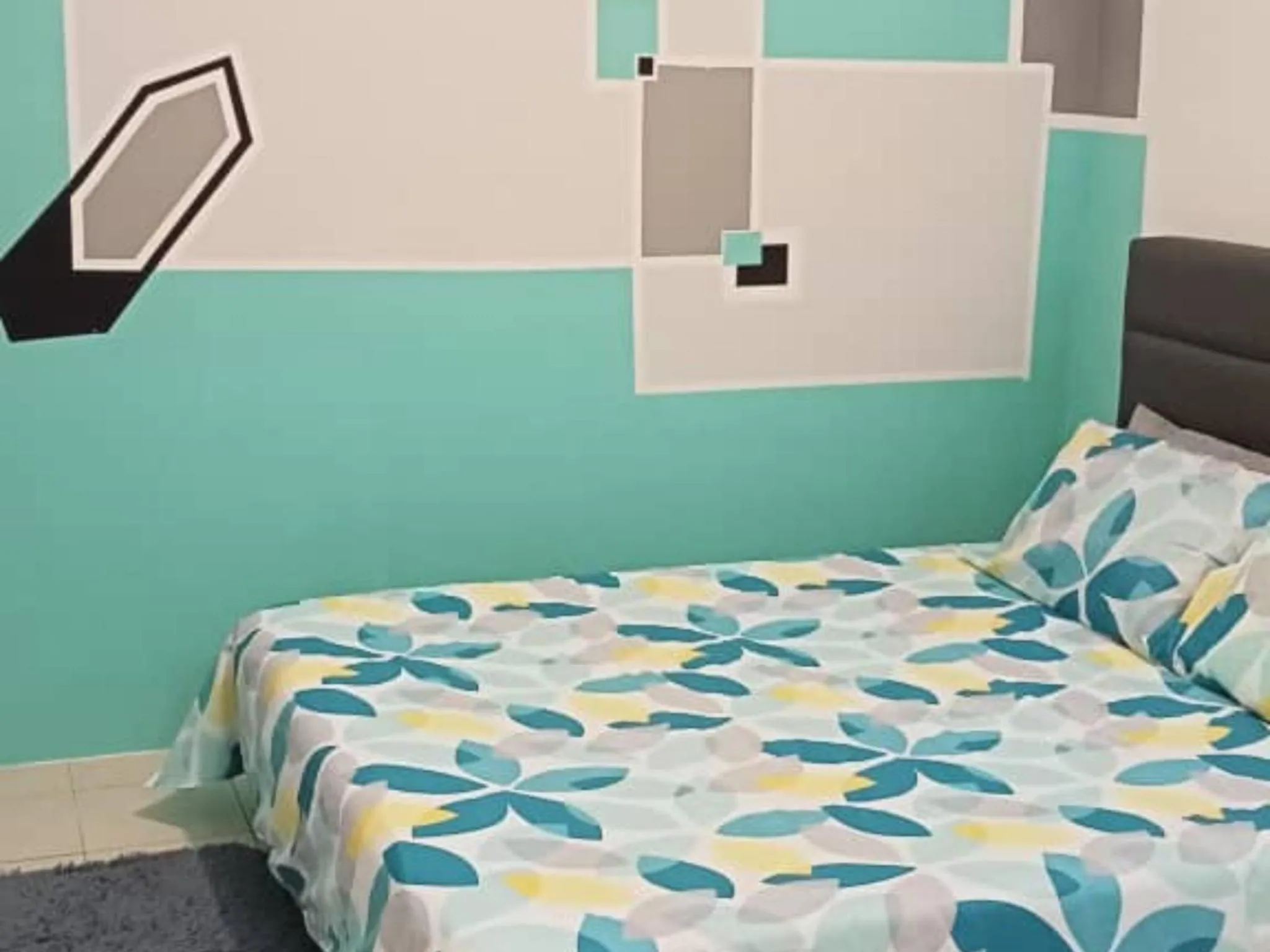 Bed in Barakah Sufi Home Stay Apartment Cameron