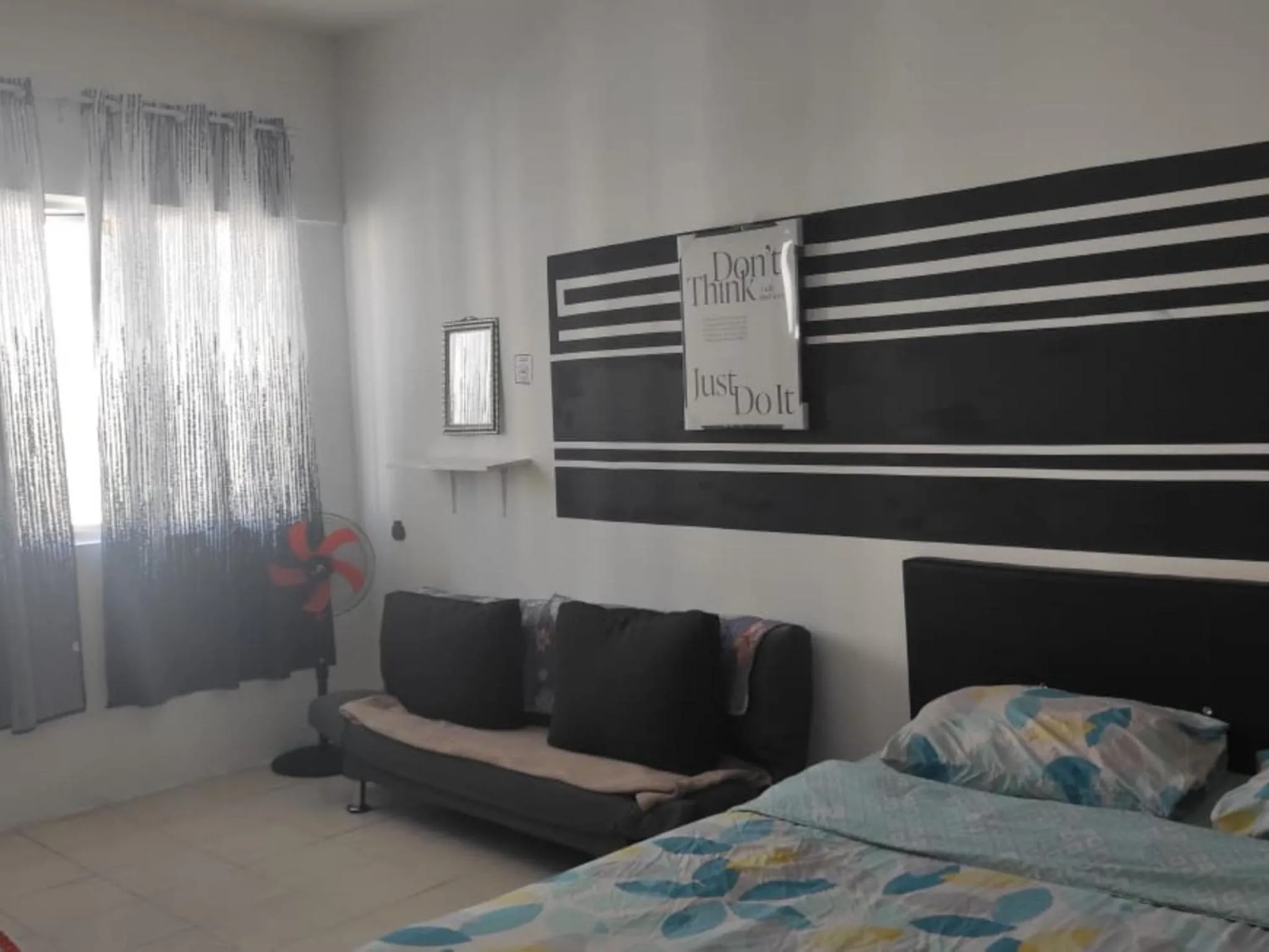 Bed in Barakah Sufi Home Stay Apartment Cameron