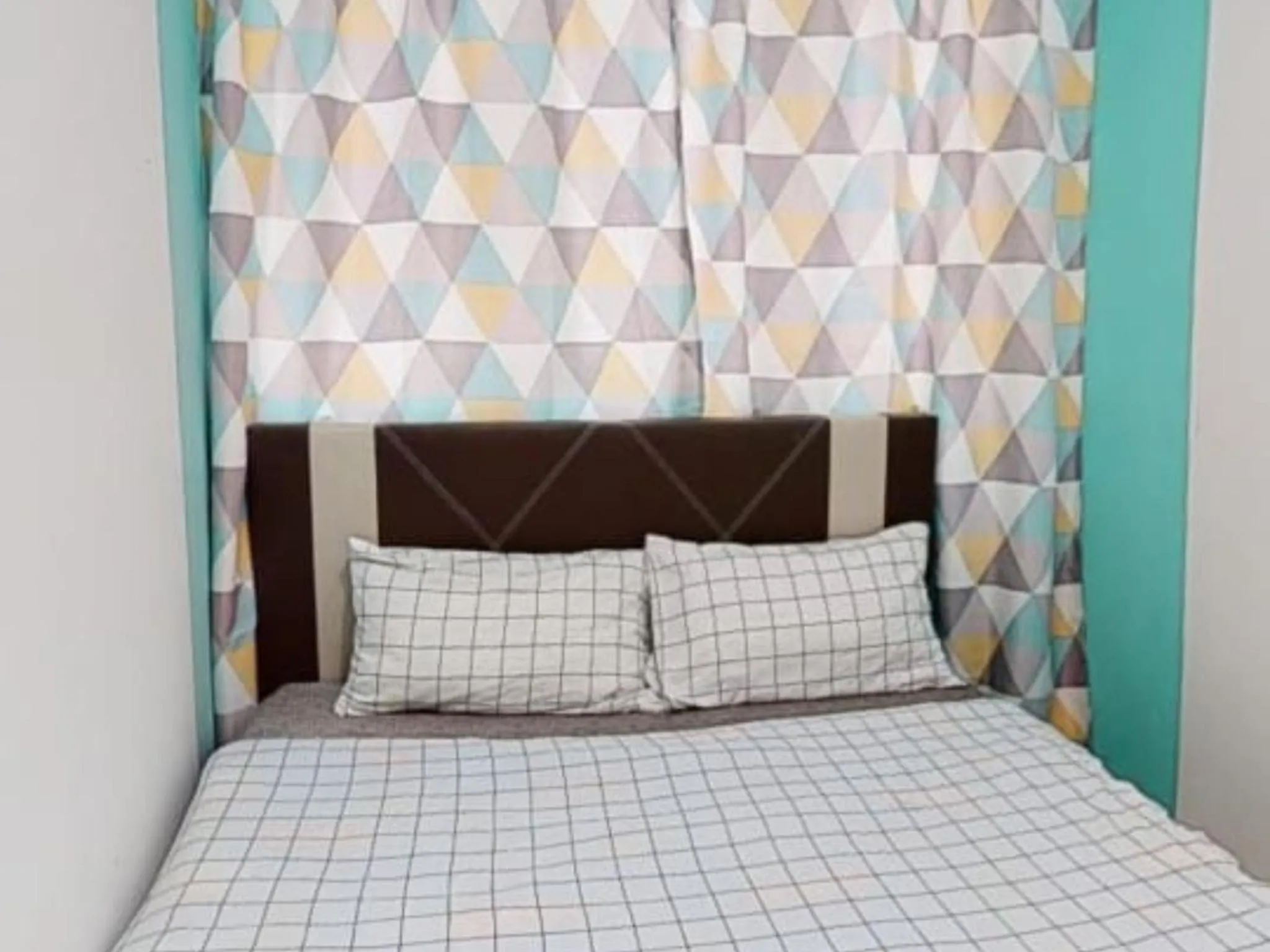 Bed in Barakah Sufi Home Stay Apartment Cameron