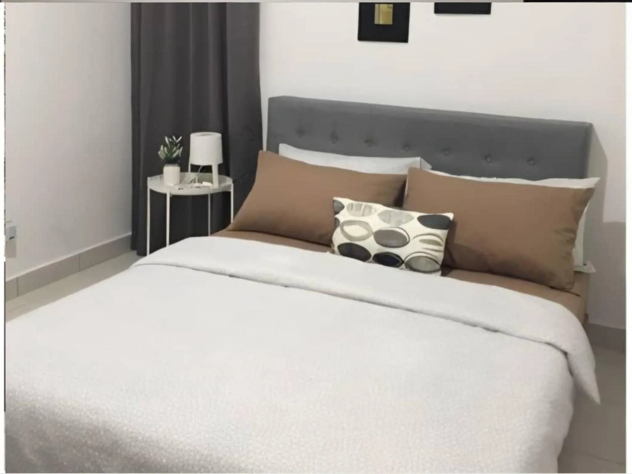 Bed in Barakah Sufi Home Stay Apartment Cameron