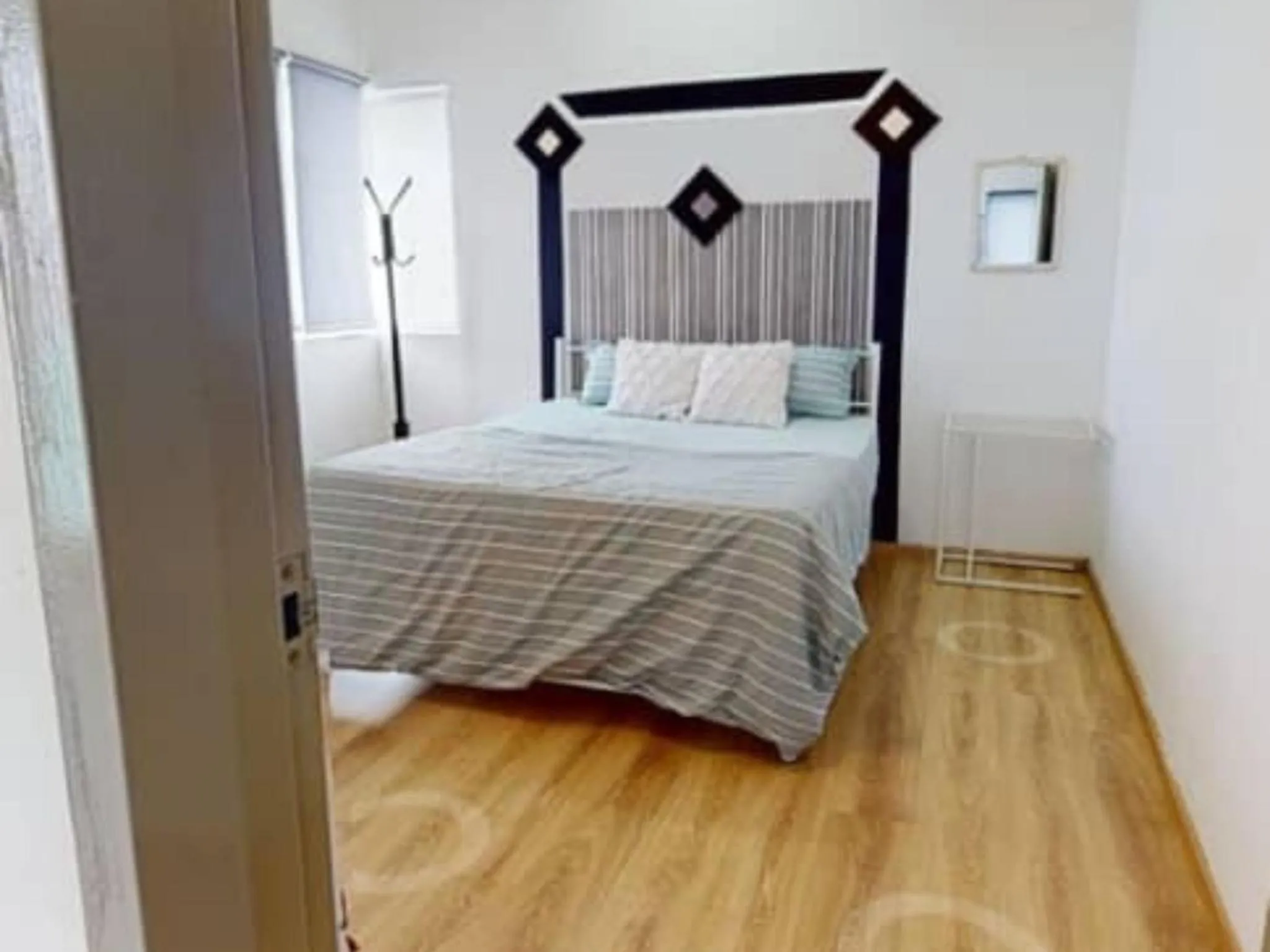 Bed in Barakah Sufi Home Stay Apartment Cameron