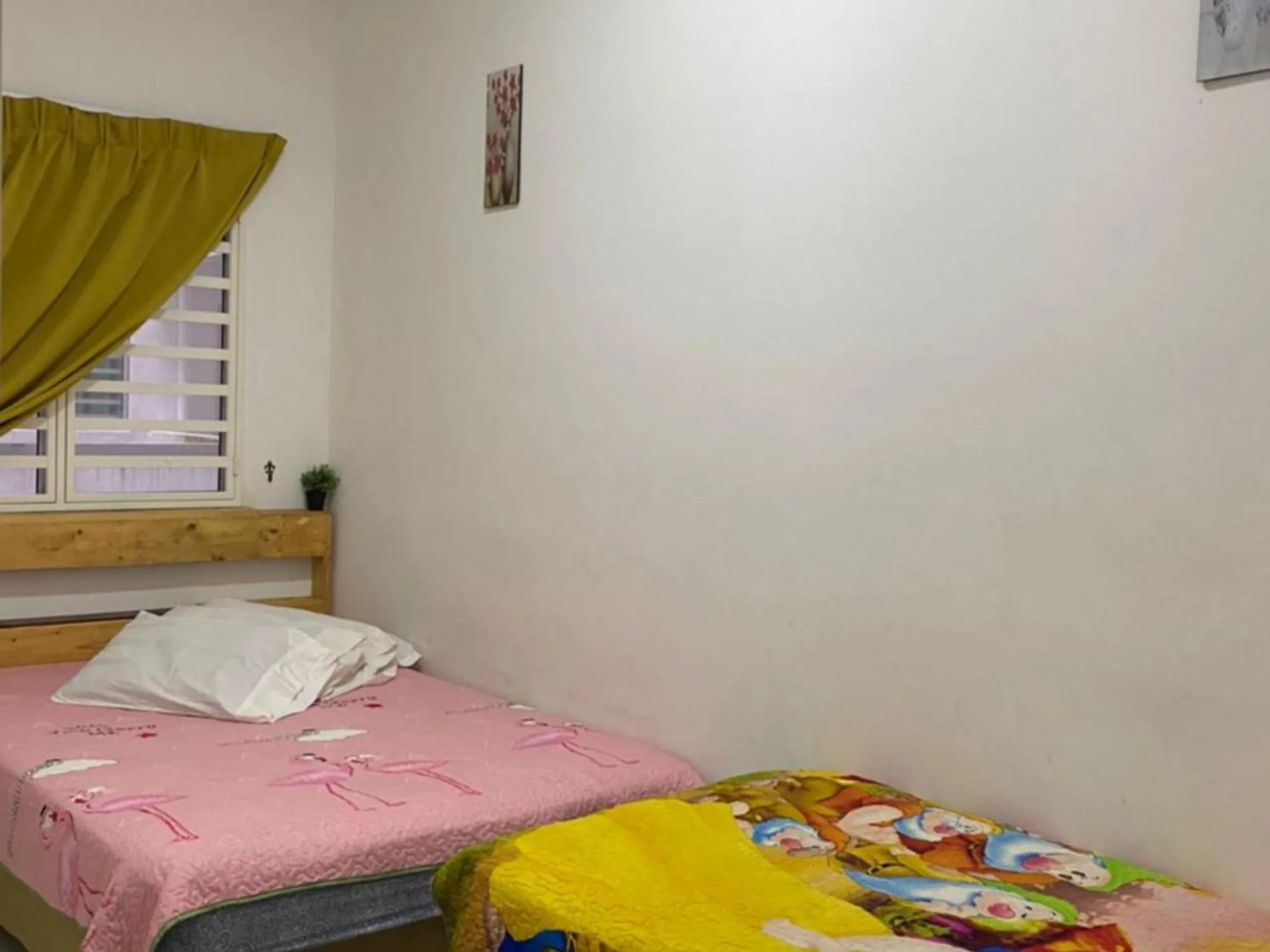 Bed in Barakah Sufi Home Stay Apartment Cameron