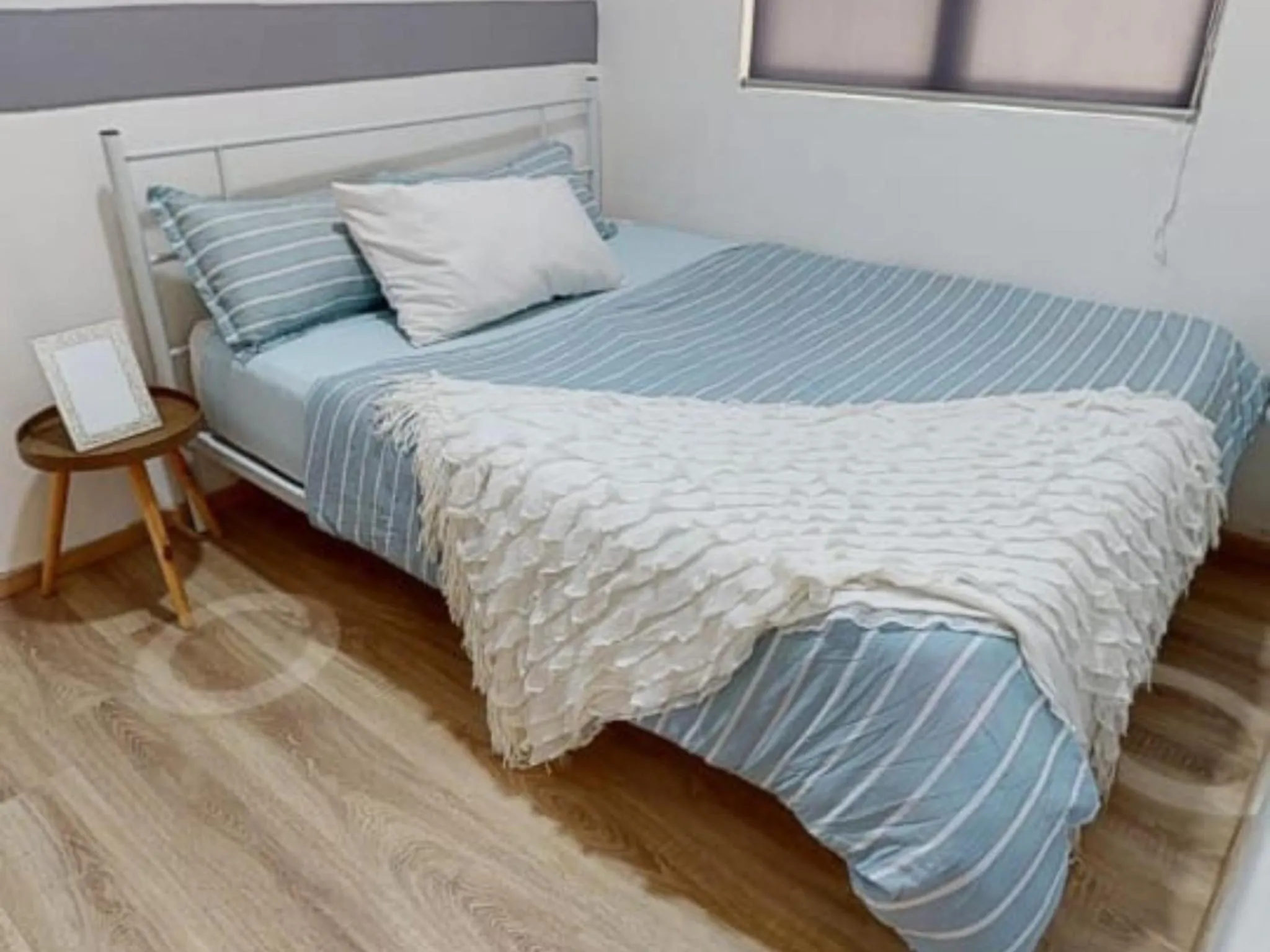 Bed in Barakah Sufi Home Stay Apartment Cameron