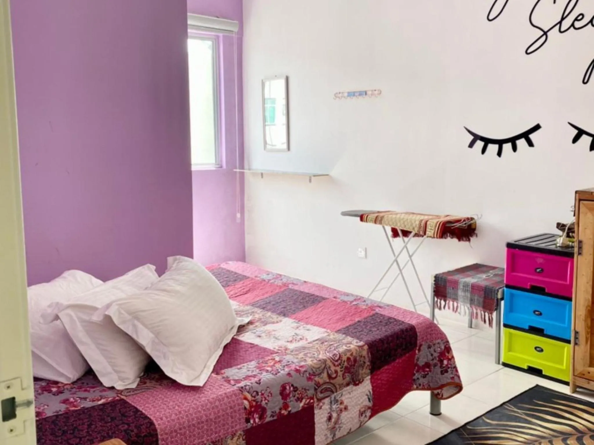 Bed in Barakah Sufi Home Stay Apartment Cameron