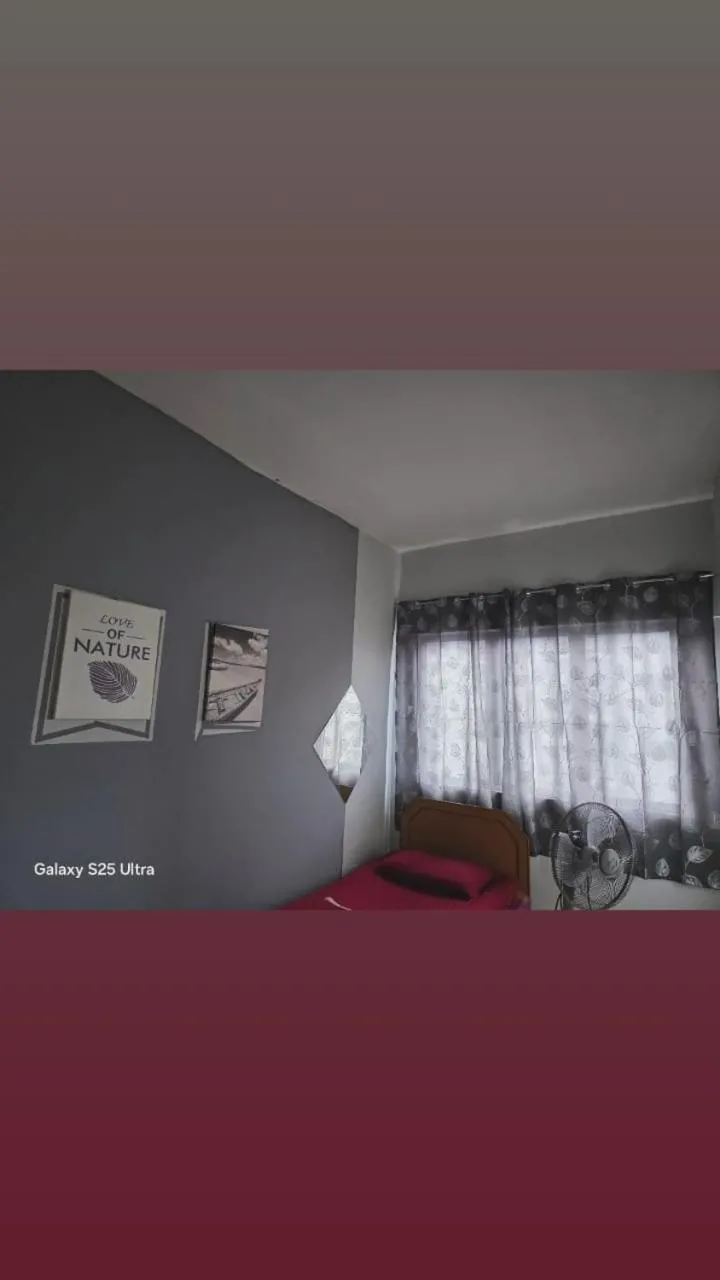 Bed in Barakah Sufi Home Stay Apartment Cameron