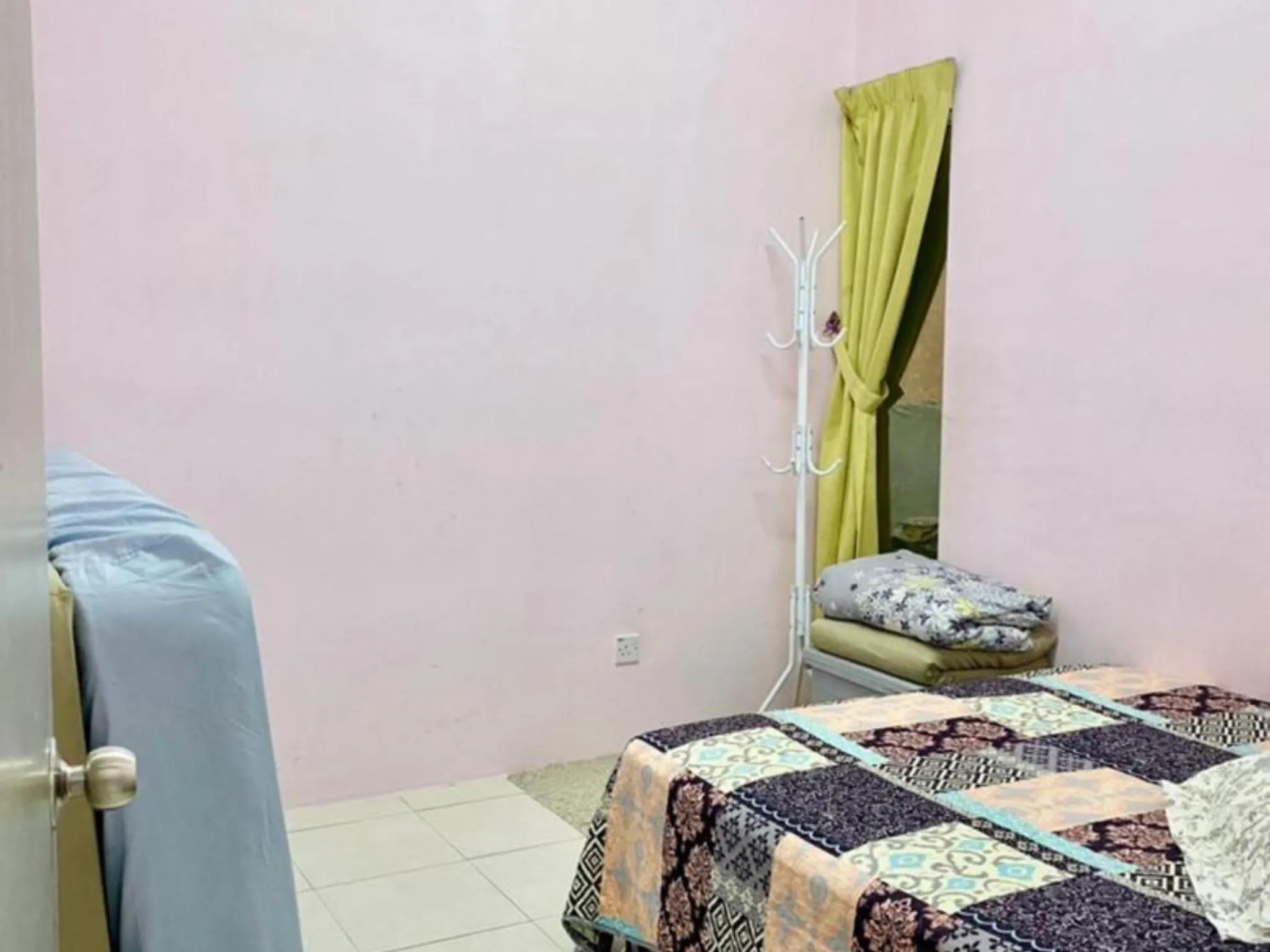 Bed in Barakah Sufi Home Stay Apartment Cameron