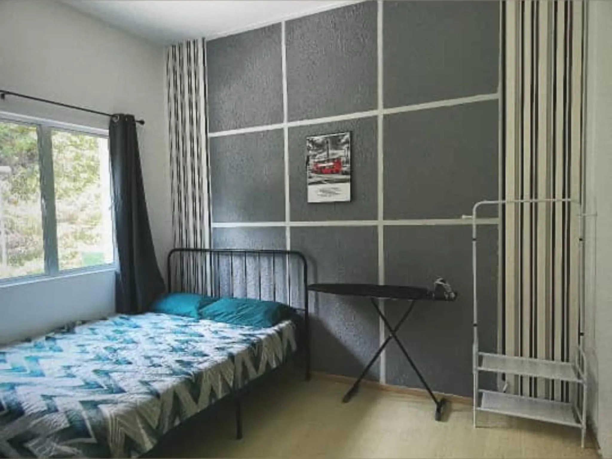 Bed in Barakah Sufi Home Stay Apartment Cameron
