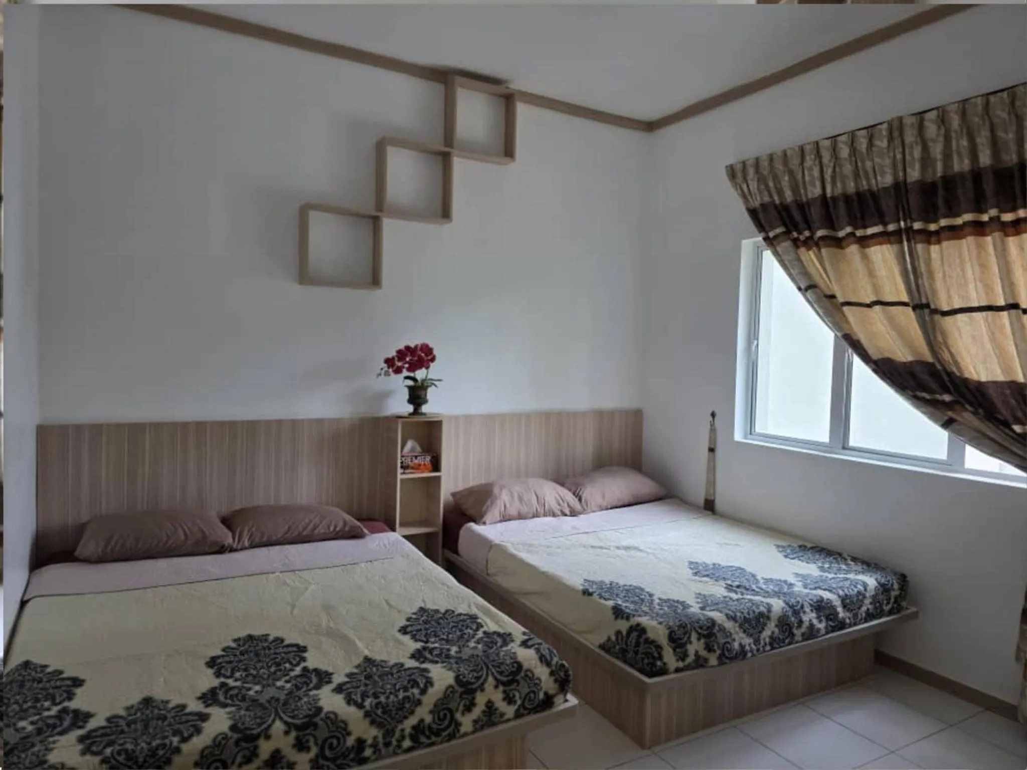 Bed in Barakah Sufi Home Stay Apartment Cameron