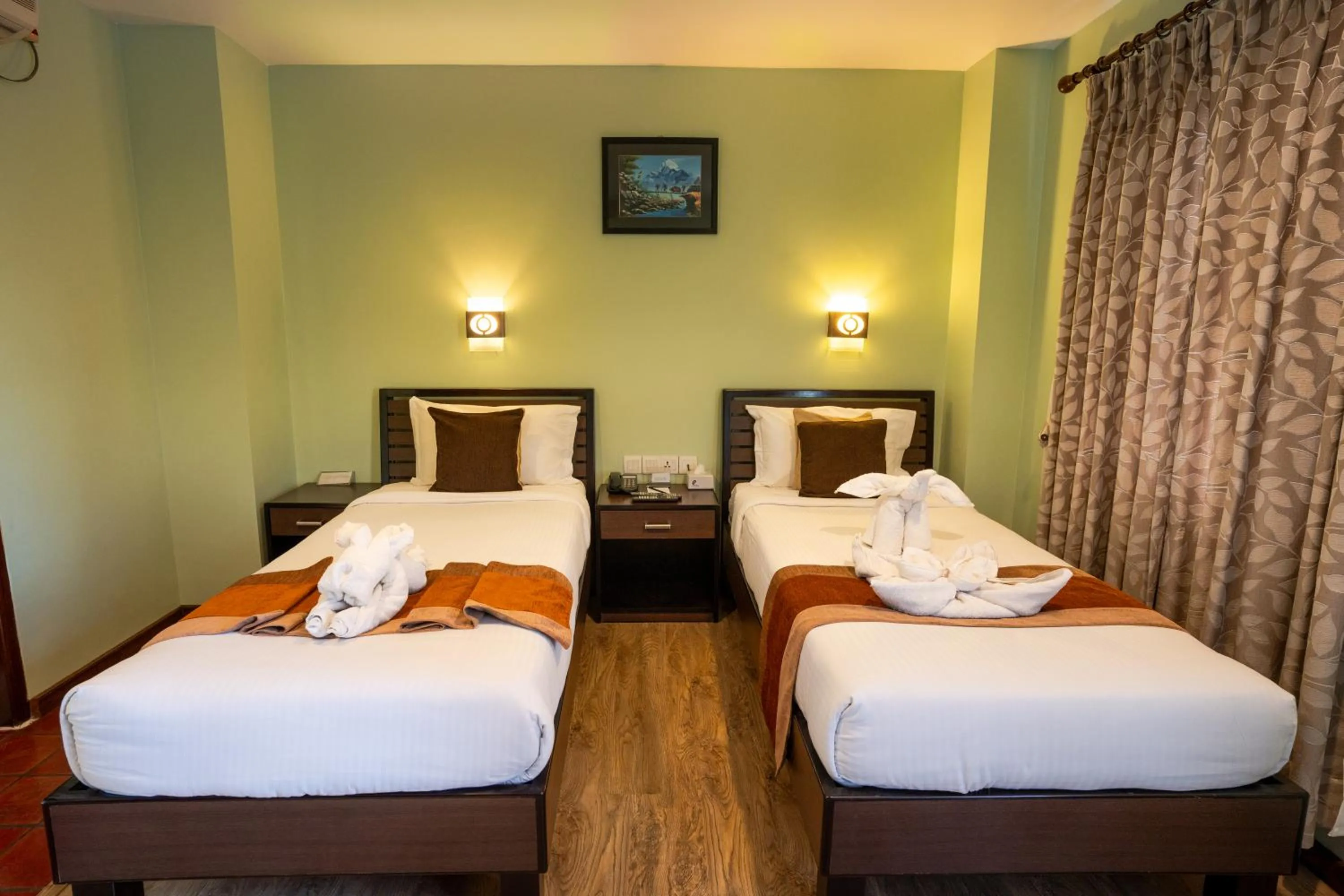 Bed in The Luxe Inn Boutique Hotel