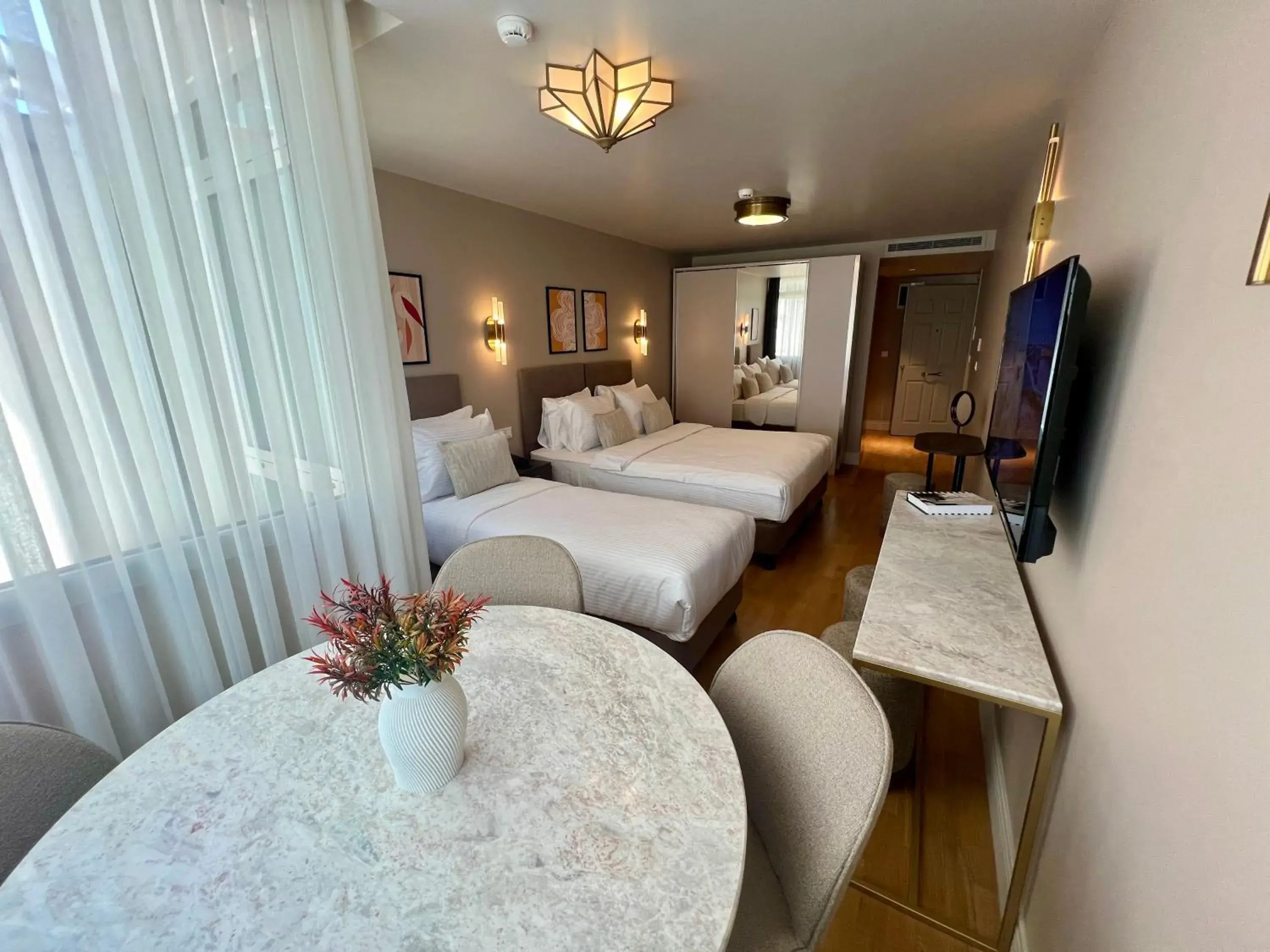 Bed in Weingart Suites Hotel Bed in Weingart Suites Hotel