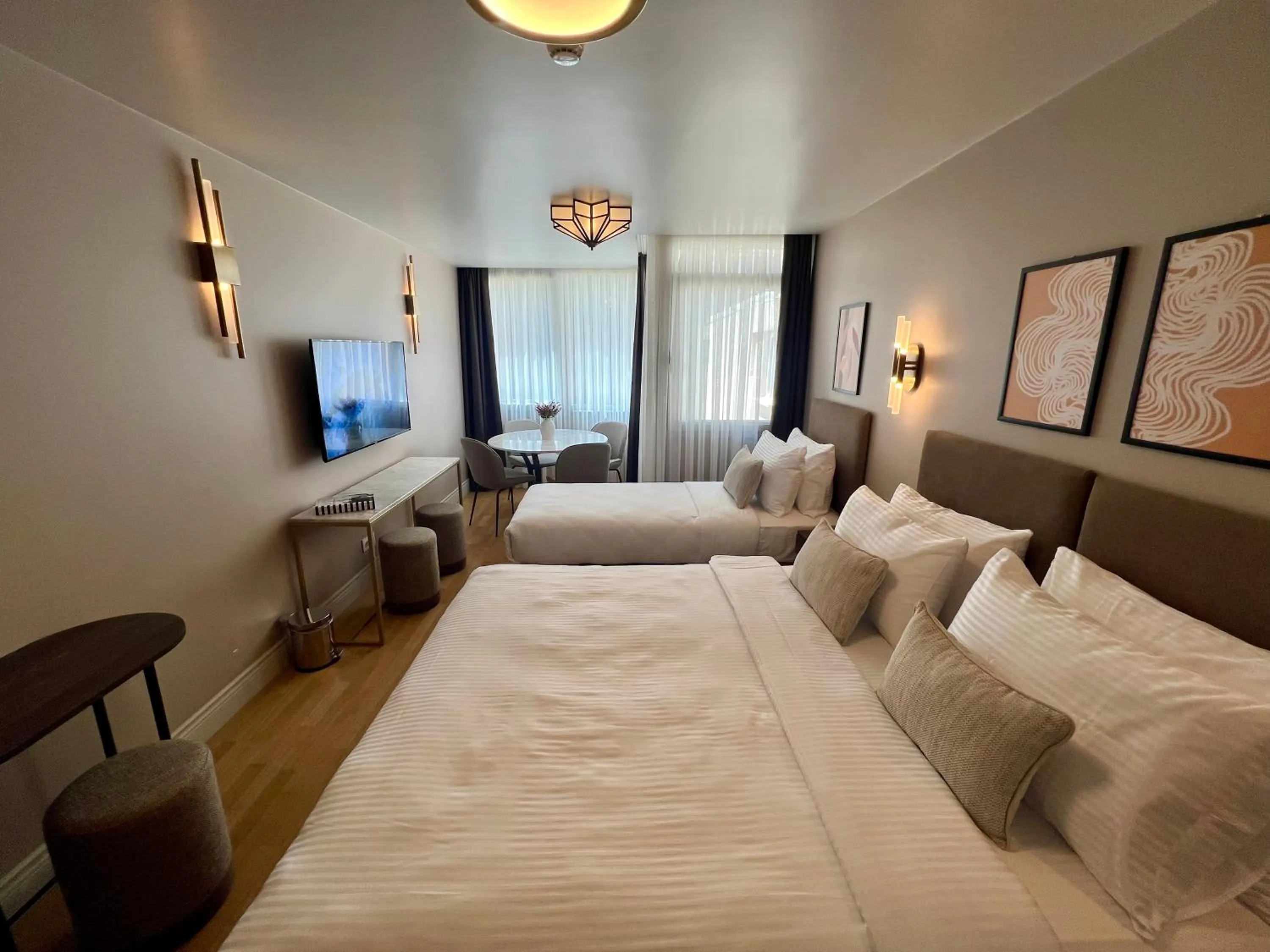 Photo of the whole room, Bed in Weingart Suites Hotel