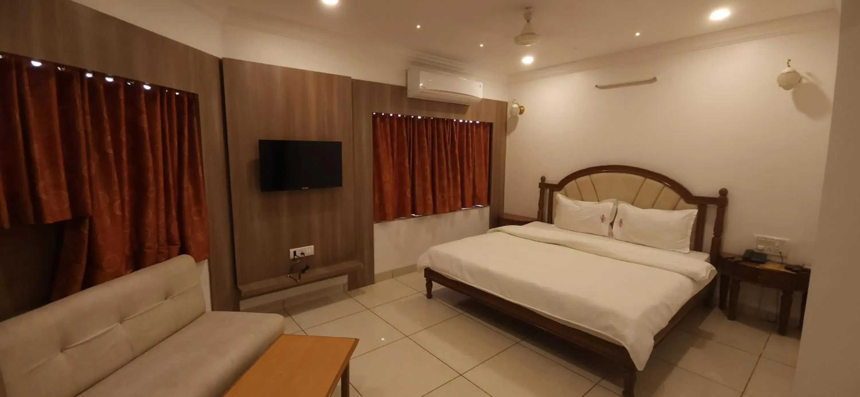 Bed in HOTEL GALAXY SURAT Bed in HOTEL GALAXY SURAT