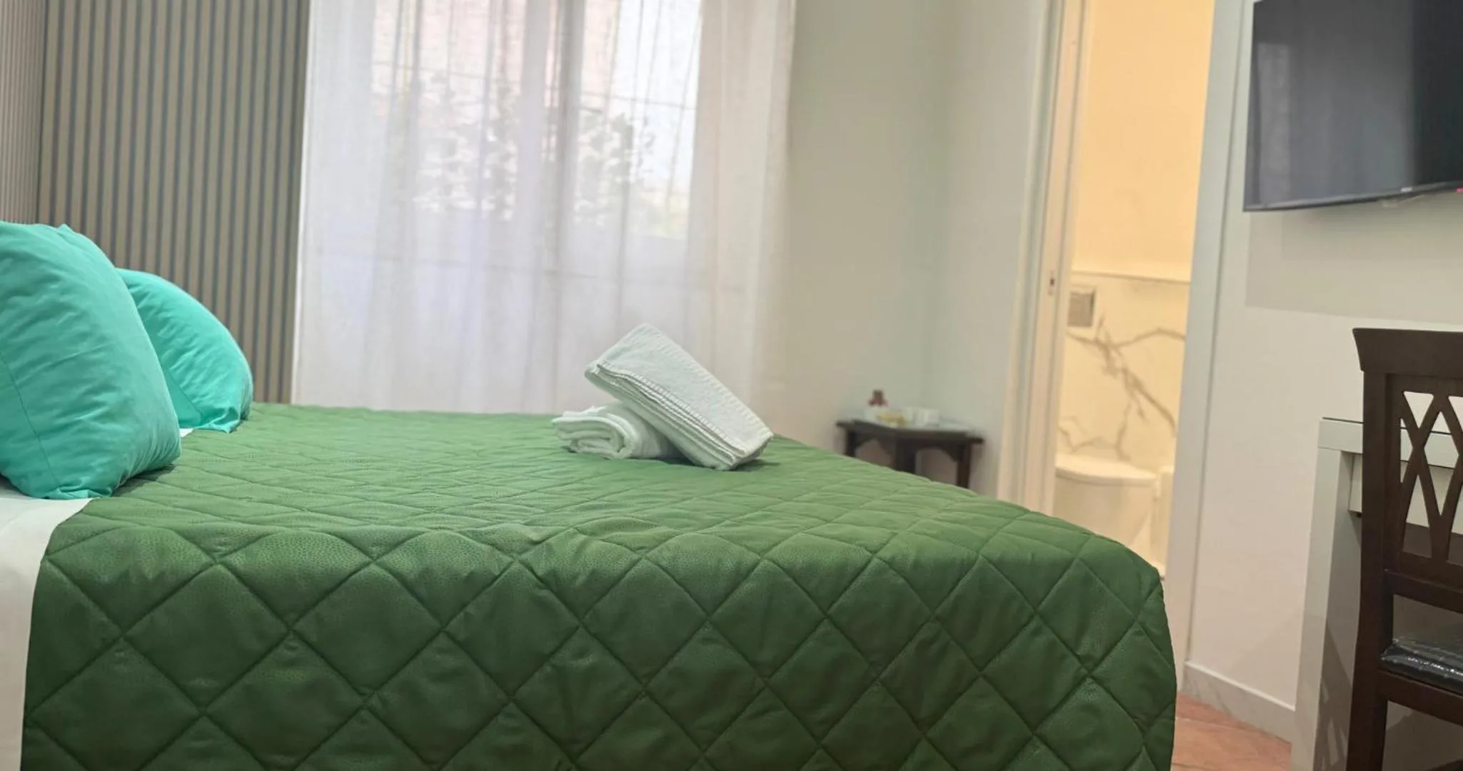 Bed in Ambasciata Sorrento Relais