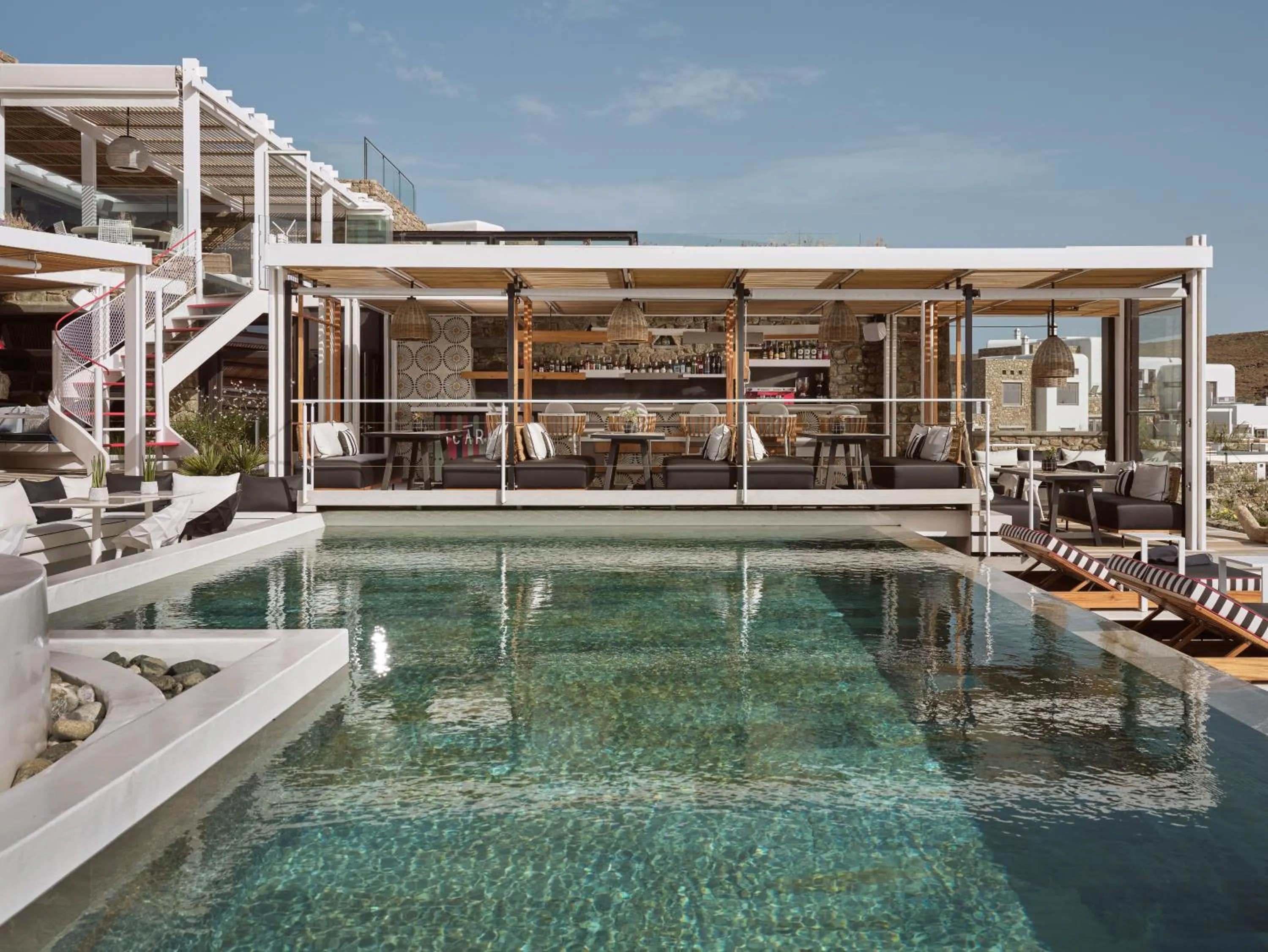 Day in Semeli Coast Mykonos Curio Collection by Hilton