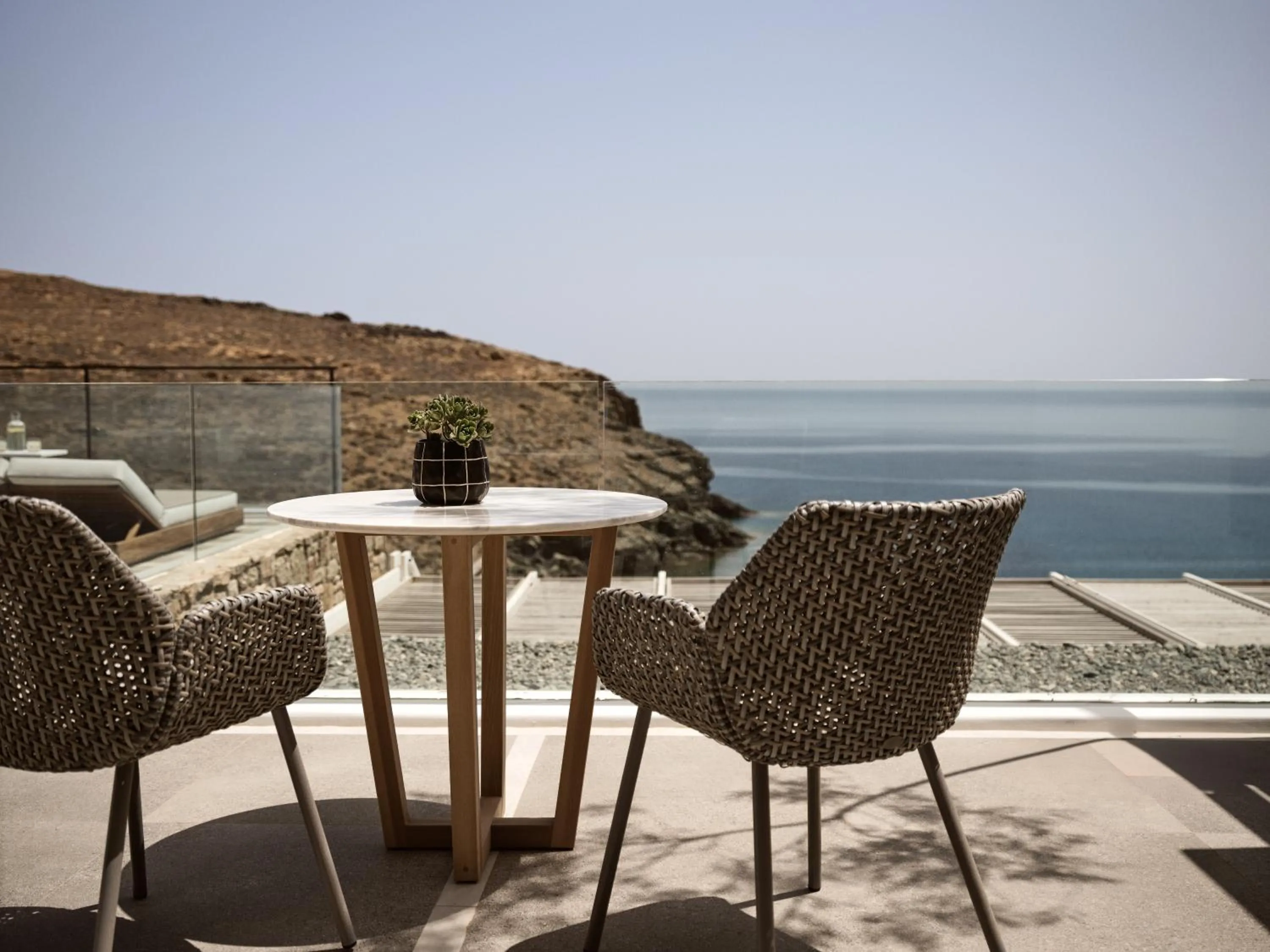 Patio in Semeli Coast Mykonos Curio Collection by Hilton