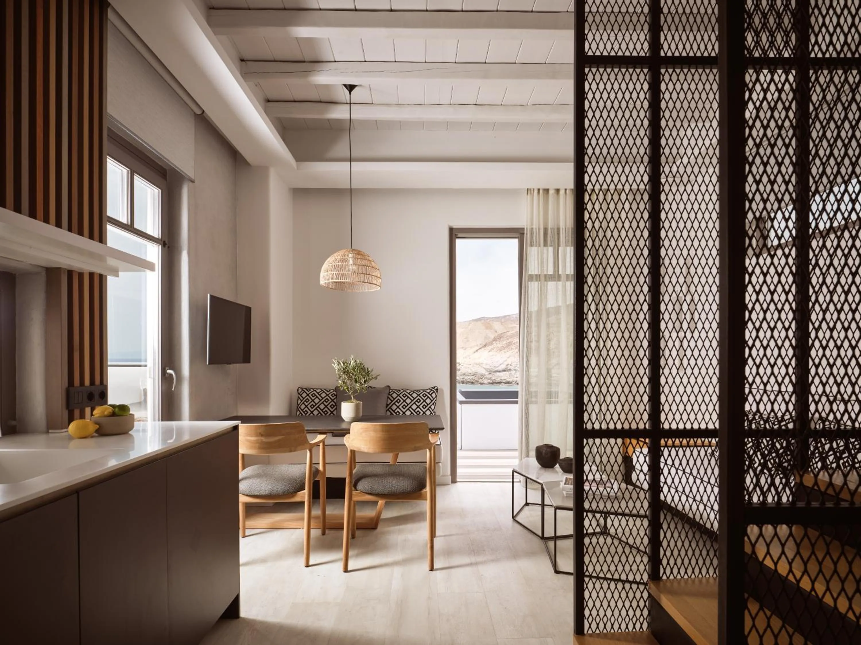 Seating area in Semeli Coast Mykonos Curio Collection by Hilton