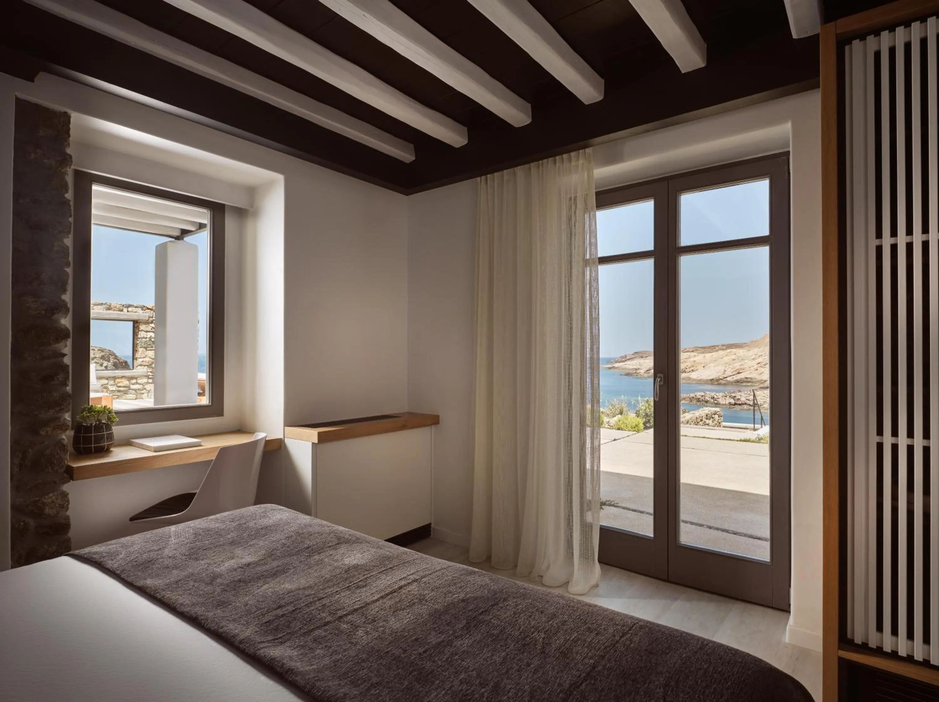 Bed in Semeli Coast Mykonos Curio Collection by Hilton