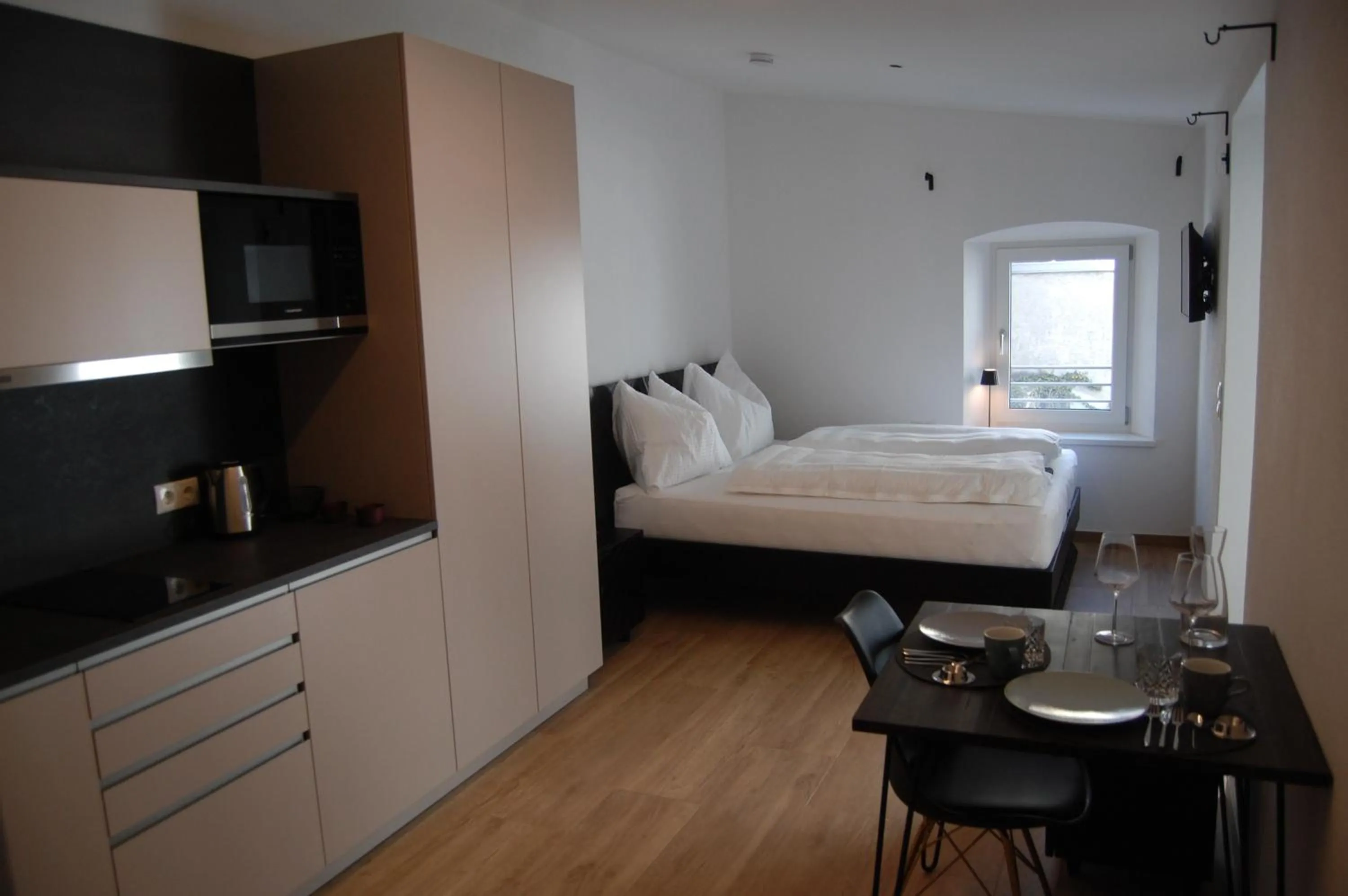 Photo of the whole room, Bed in myQuartier Luxury Hideaways digital self check in