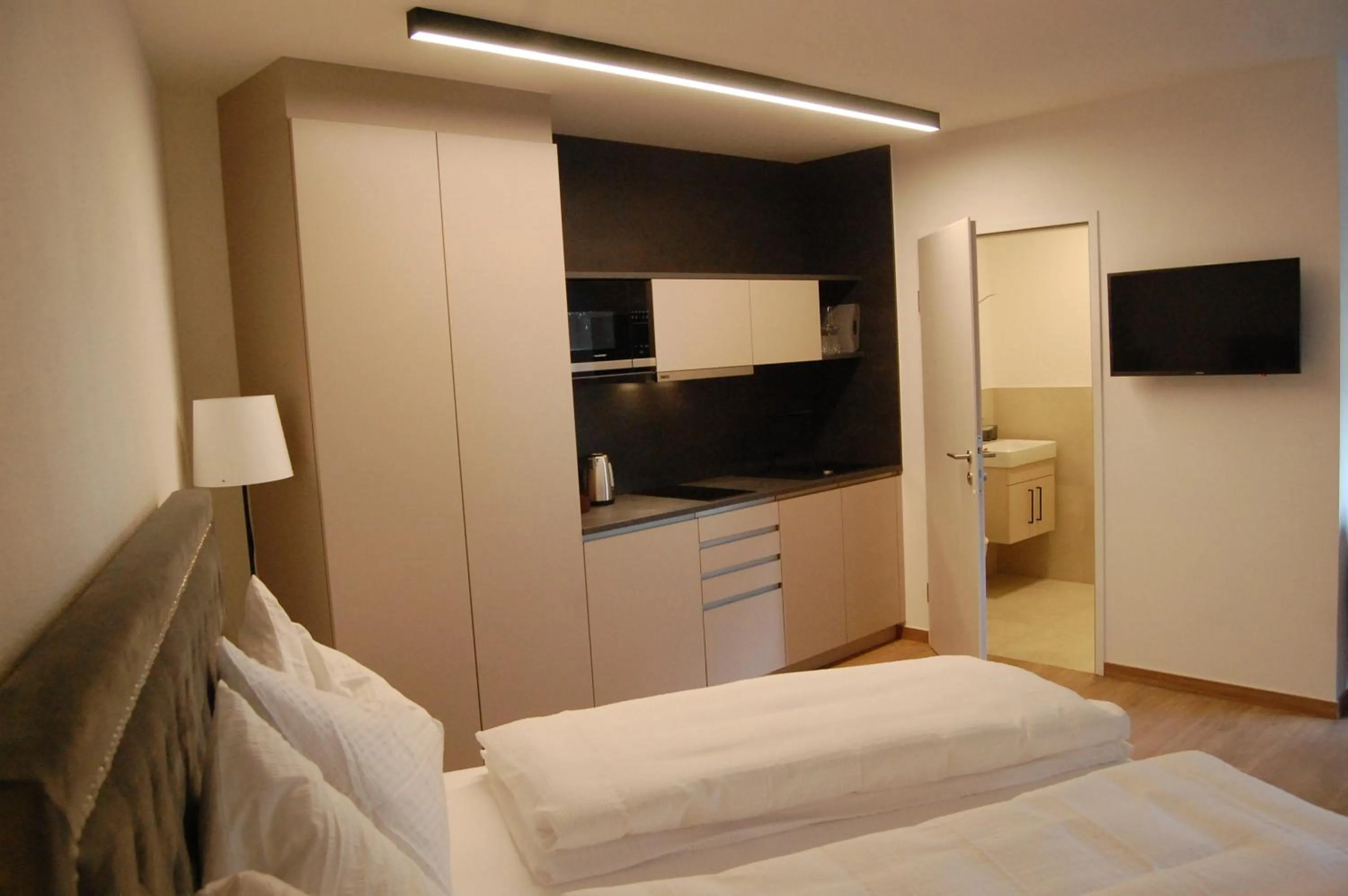 Photo of the whole room, Bed in myQuartier Luxury Hideaways digital self check in
