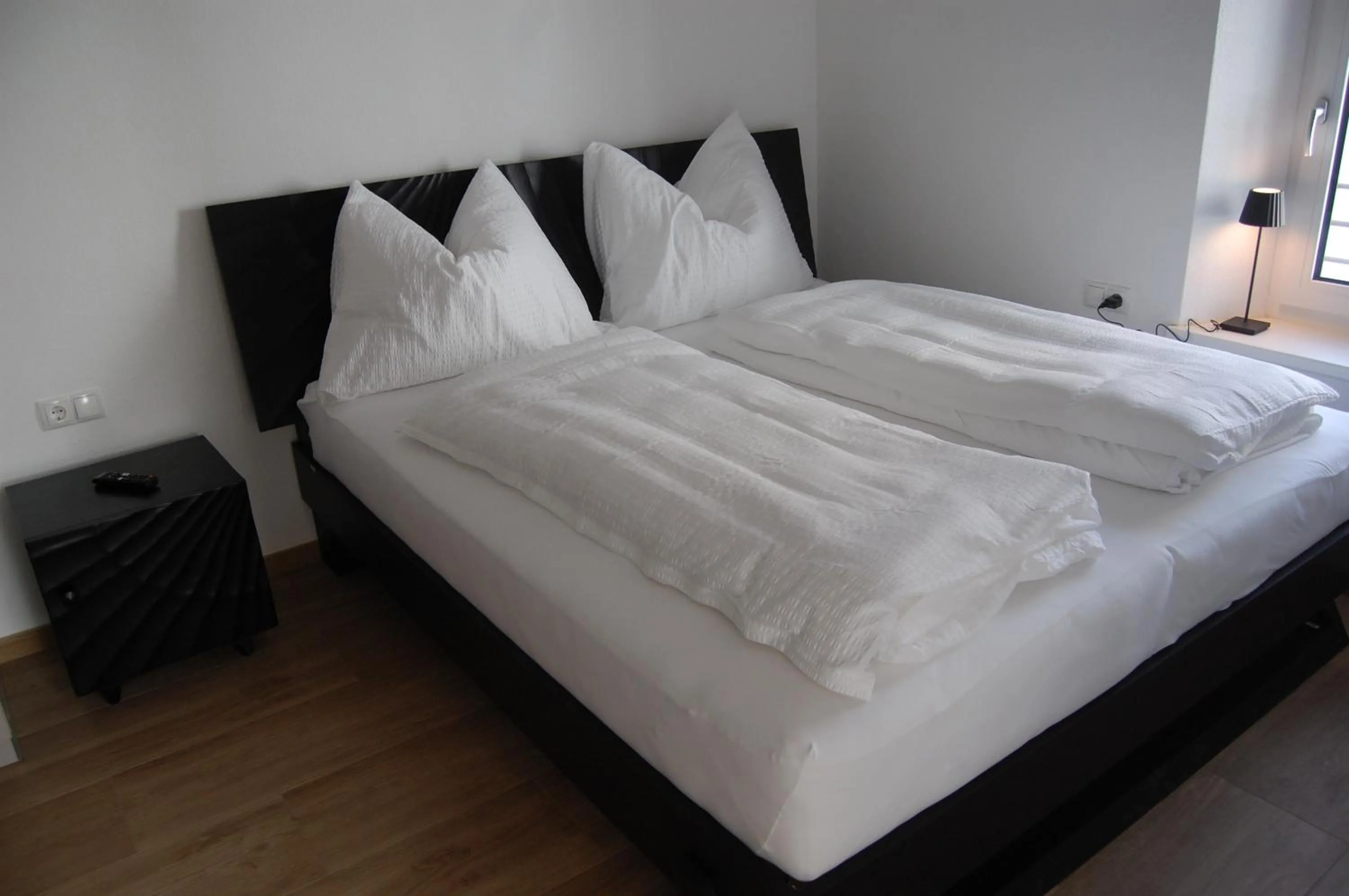 Bed in myQuartier Luxury Hideaways digital self check in