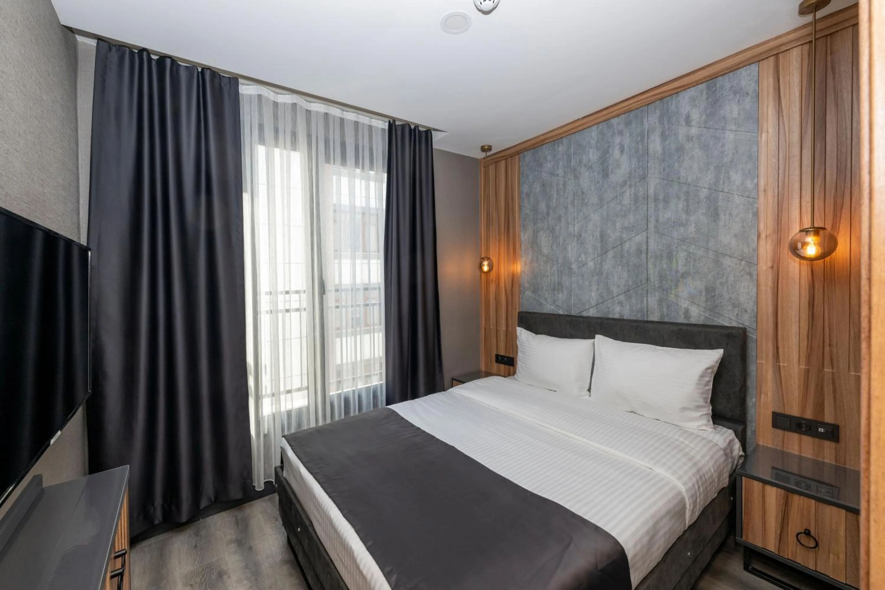 Bed in The Nirvanas Hotel