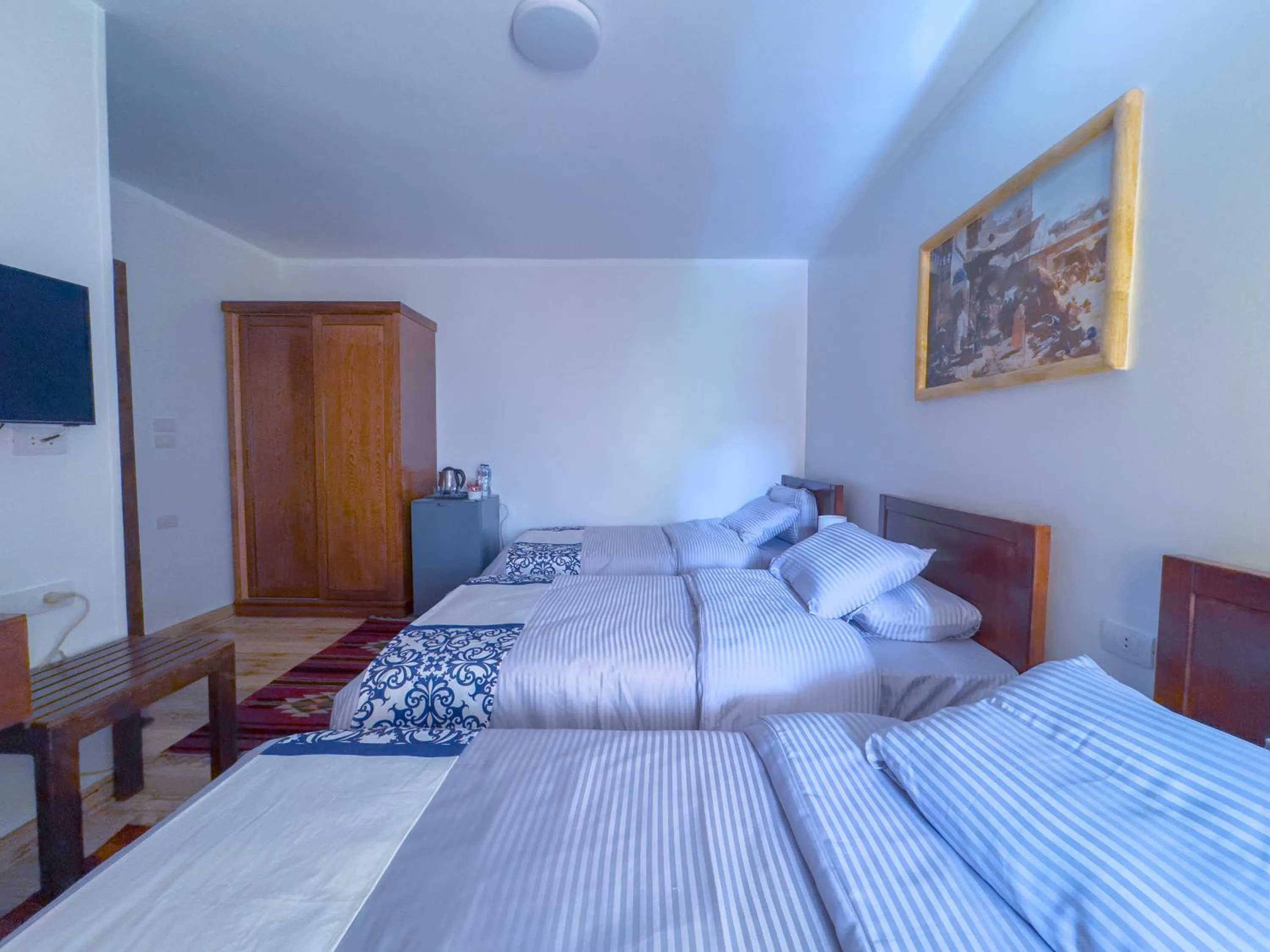 Bed in Royal Crown Hotel Giza Pyramids View